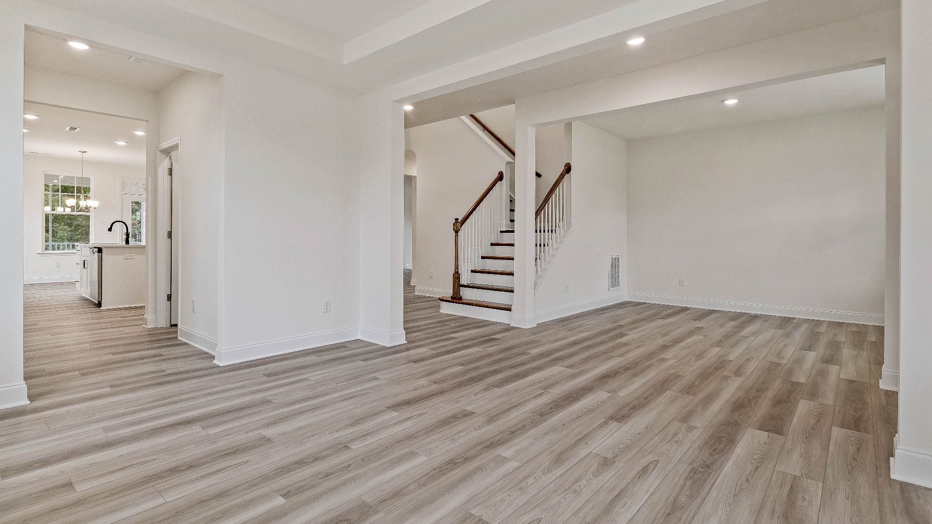 Stonehaven home plan front entry with adjacent formal dining room and flex space