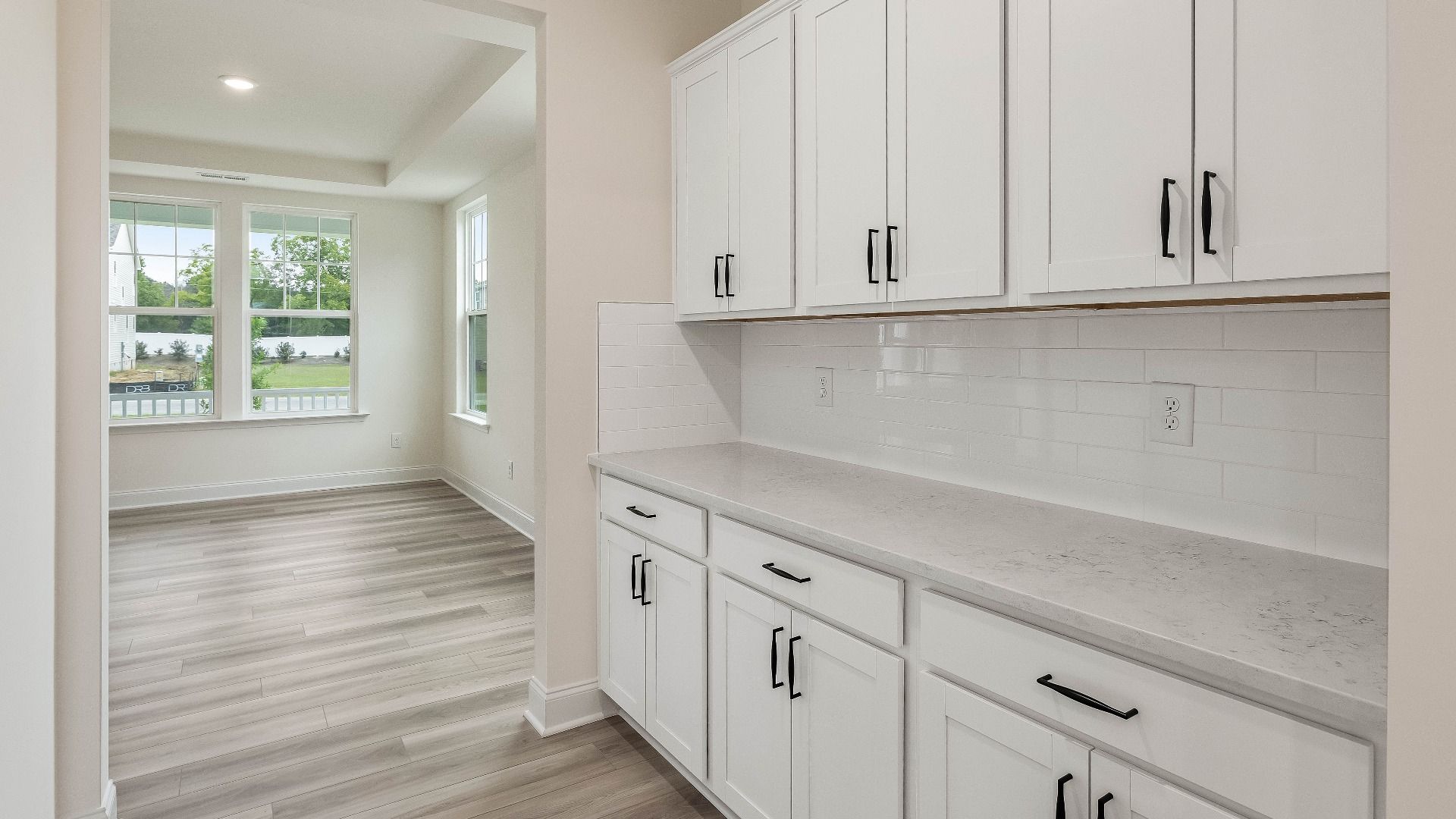 Stonehaven home plan butler's pantry connecting formal dining room and kitchen
