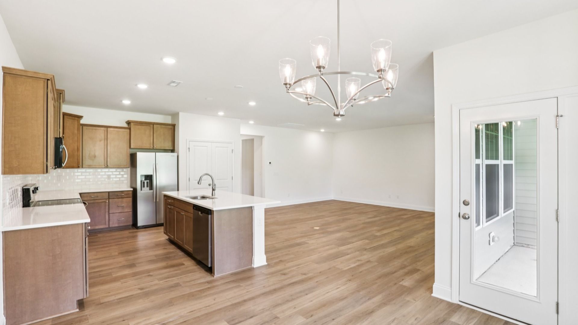 Pendleton home plan open concept kitchen, breakfast area and living room