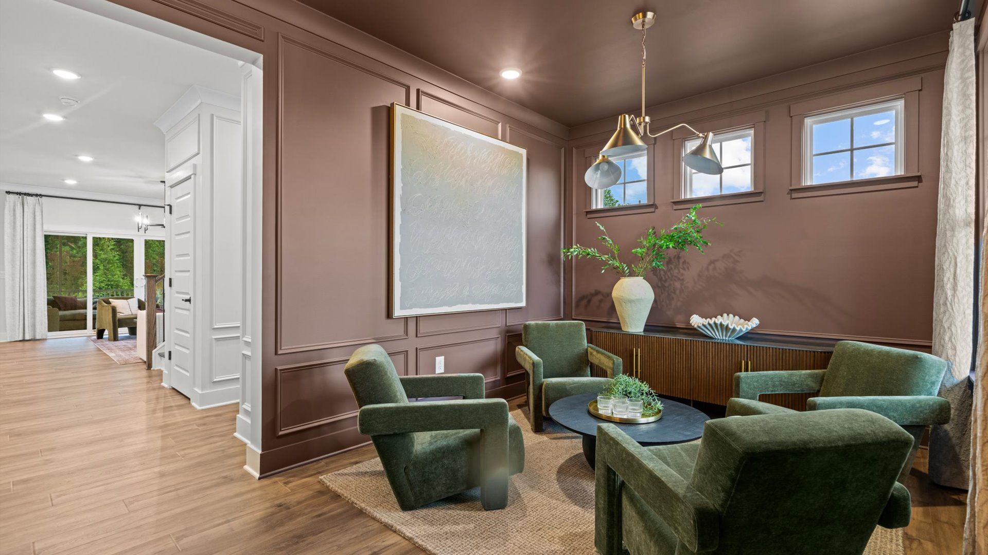 Pelham home plan entry/flex space used as a seating area