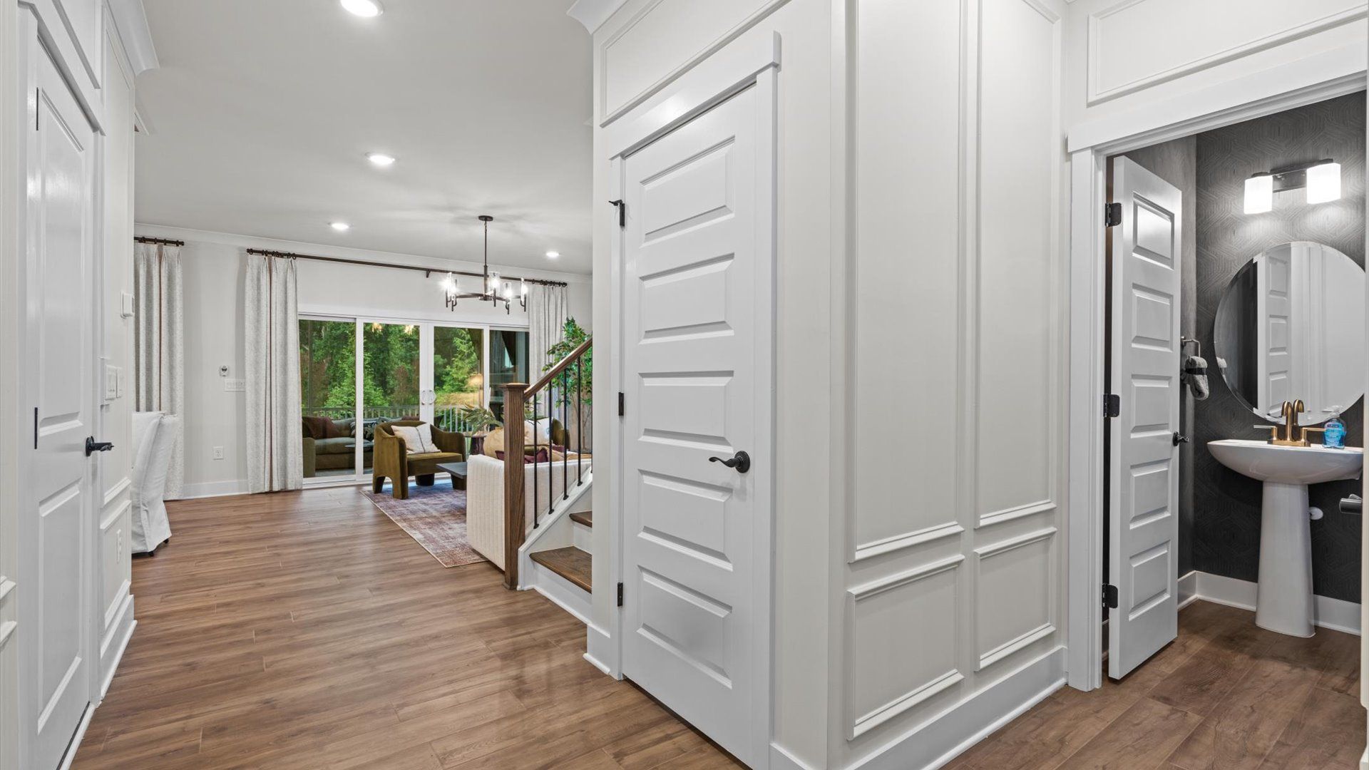 Pelham home plan entry hallway and powder bathroom