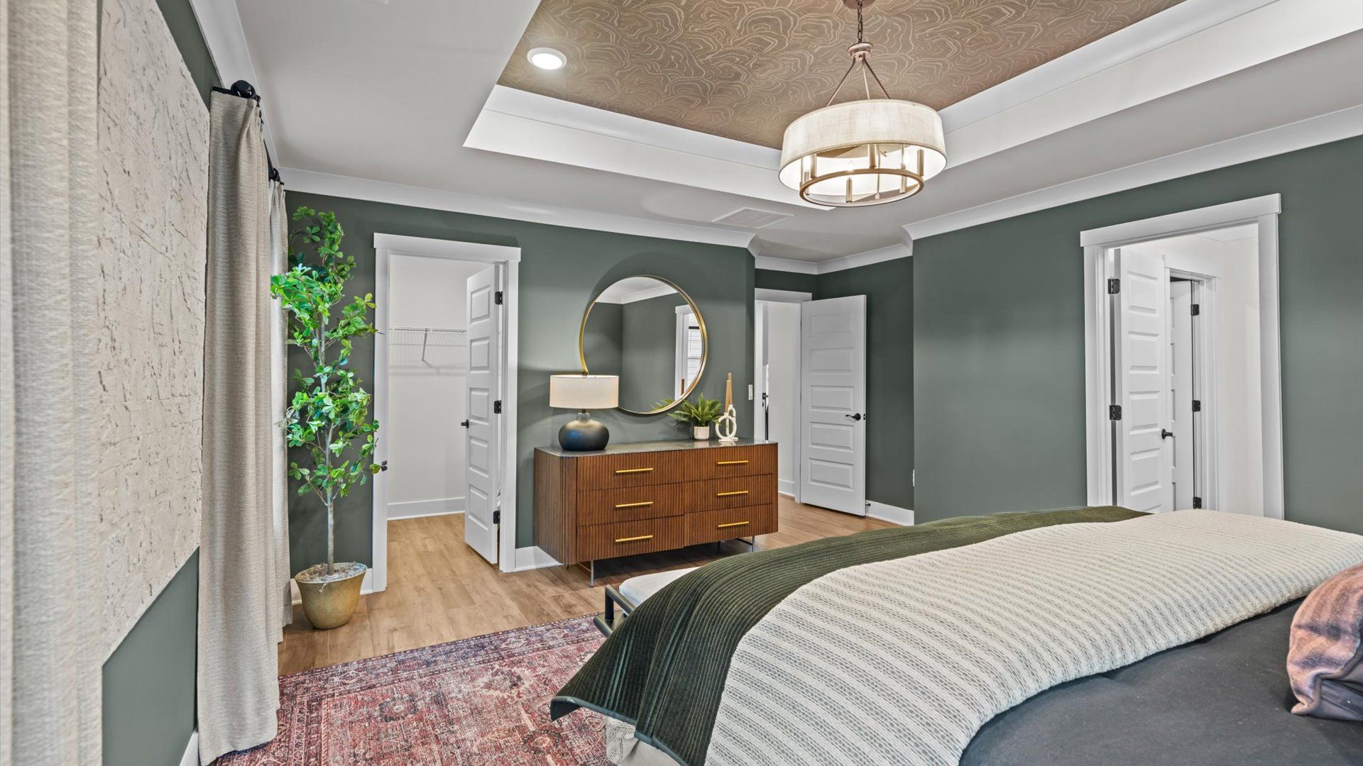 Pelham home plan spacious primary bedroom/suite with tray ceiling and en suite bathroom