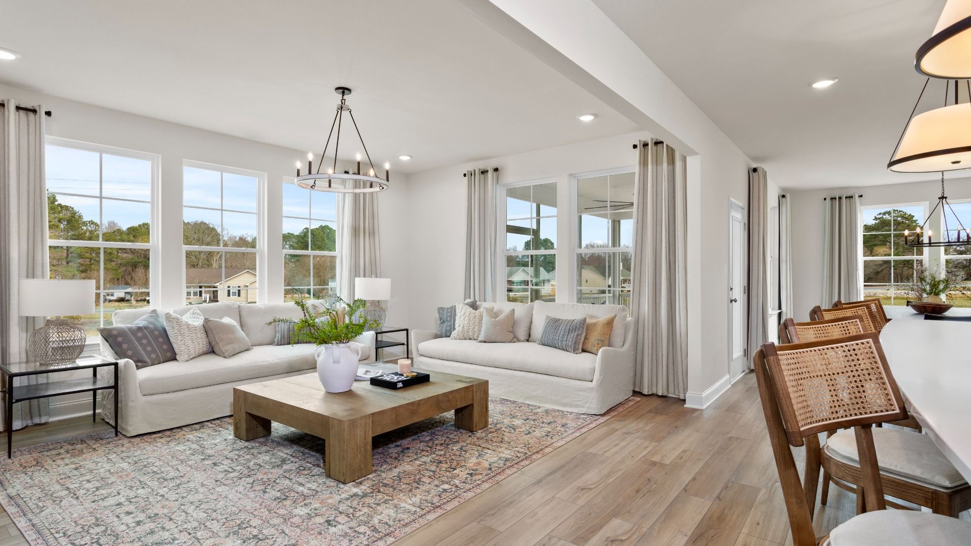 Stonefield home plan open concept family room with lots of windows