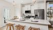 casa en Sidney Creek Townhomes por DRB Homes