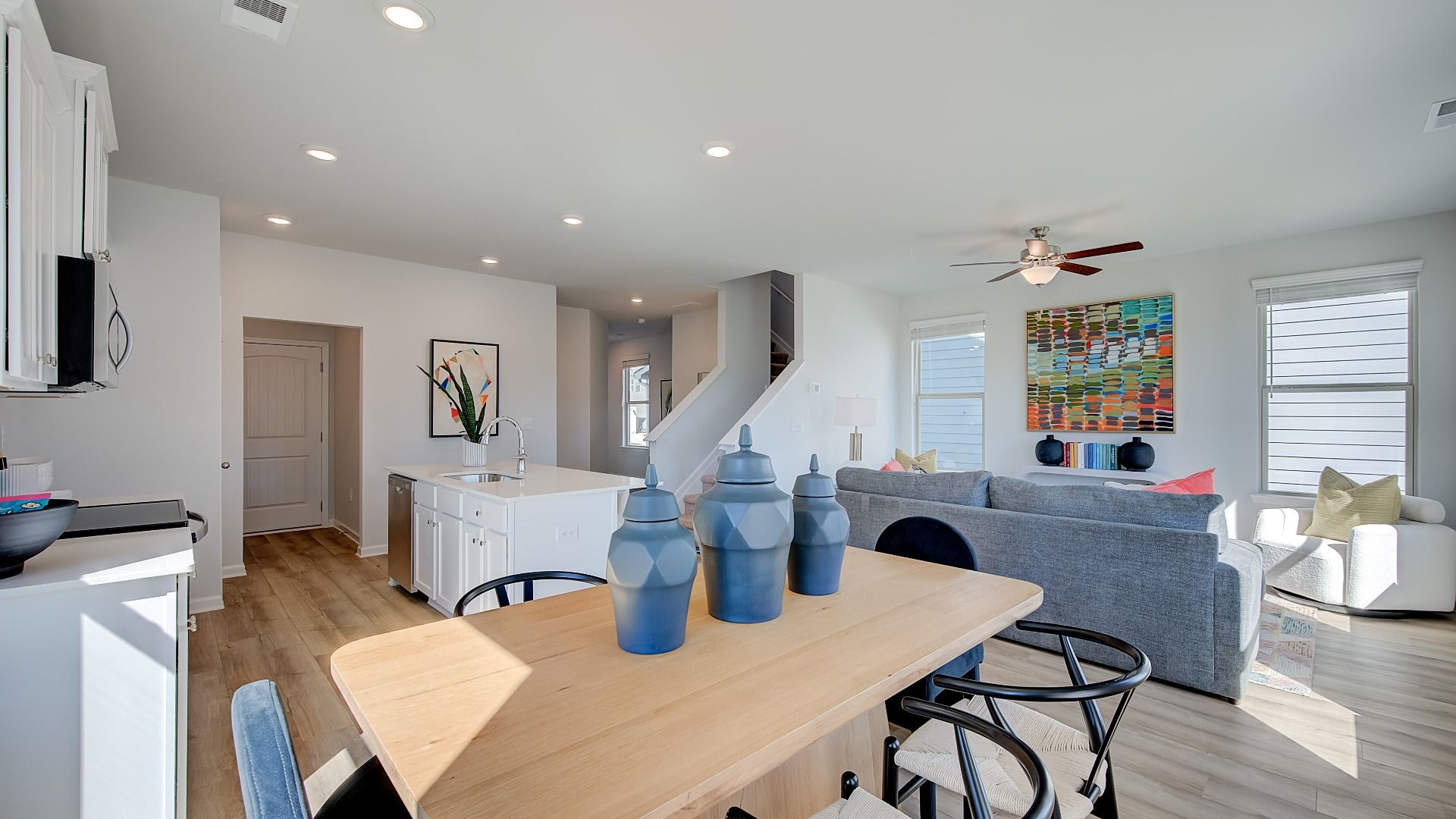 Open breakfast area in new construction home with expansive windows and natural light.