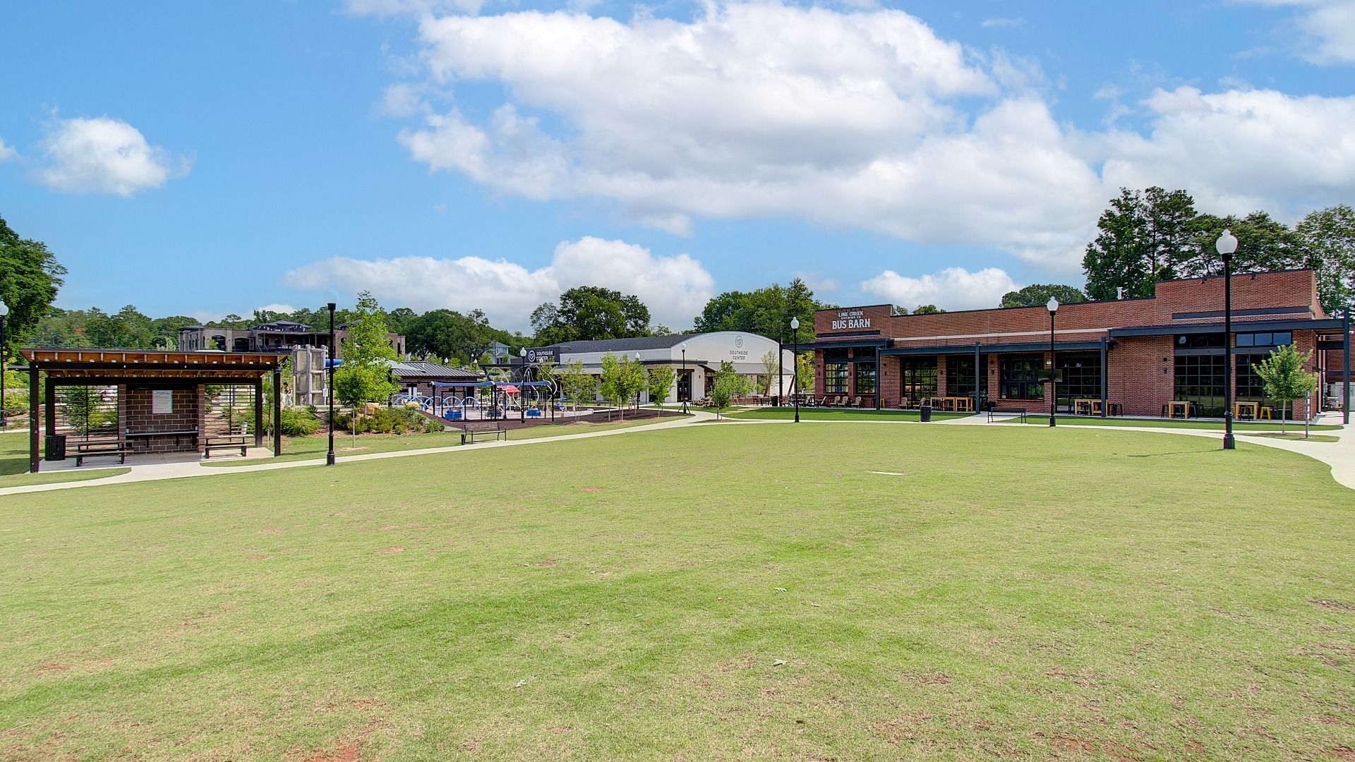 Community green space and park with restaurants in Fayetteville, Georgia.