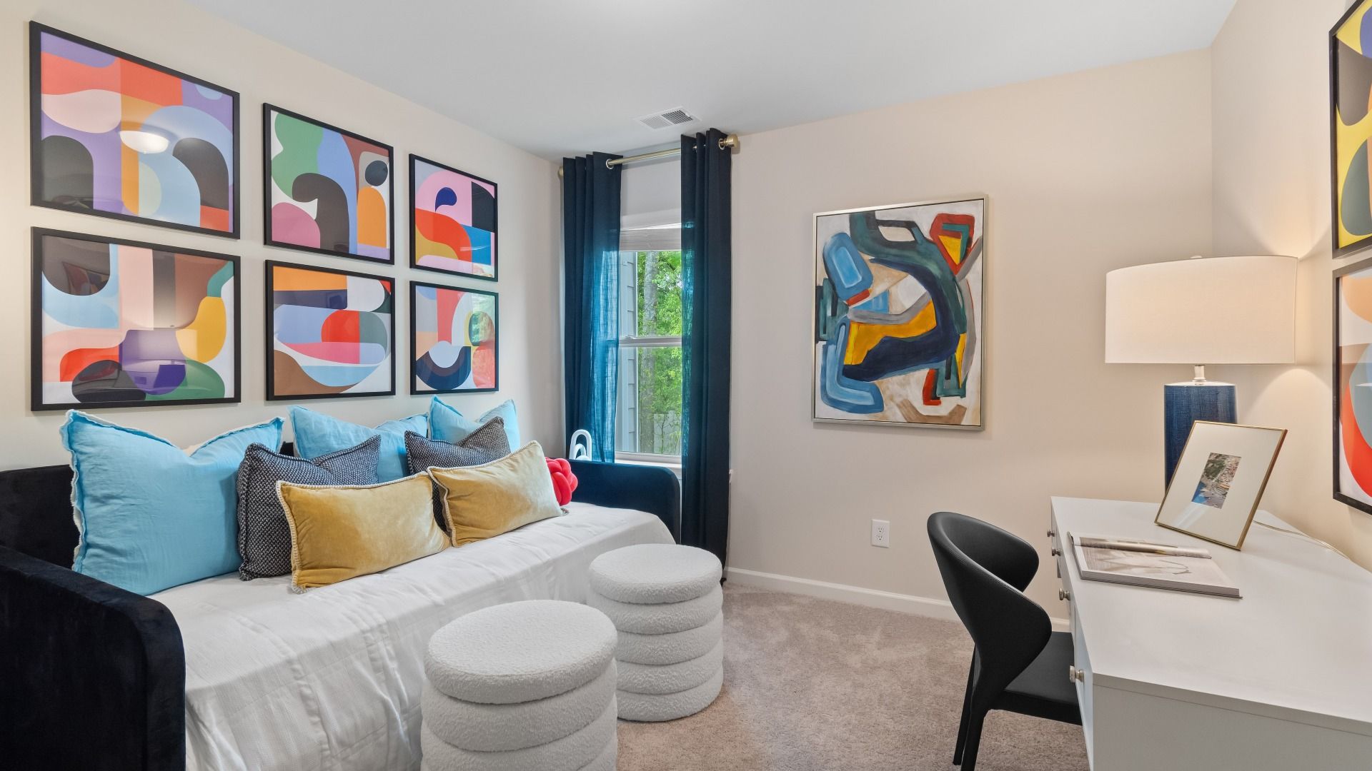 Secondary bedroom with natural light in new construction townhome at Avery Landing in McDonough, GA