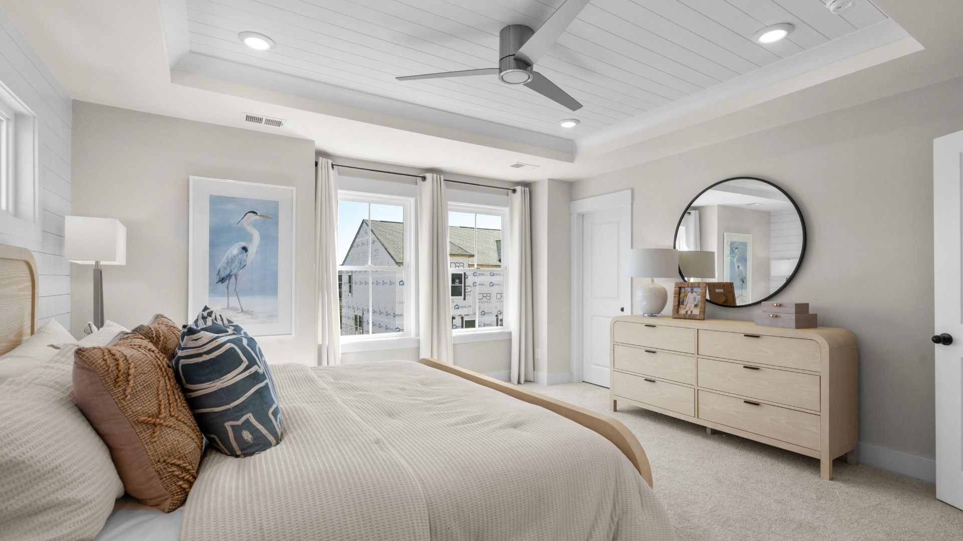 Relax in the Brookgreen primary suite at Seabreeze—serene style and comfort in every detail.