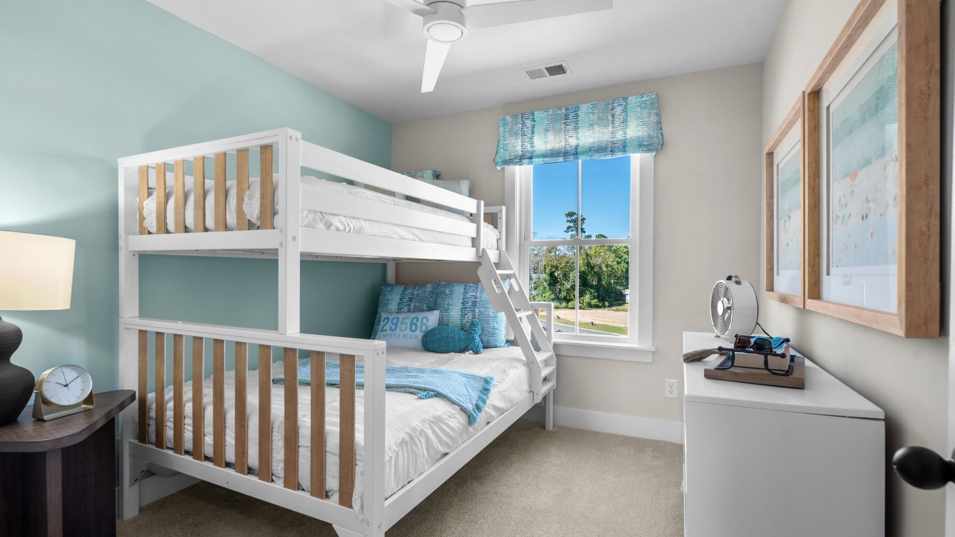 Secondary bedroom with 2 large windows on adjacent walls in a DRB Homes Brookgreen model home