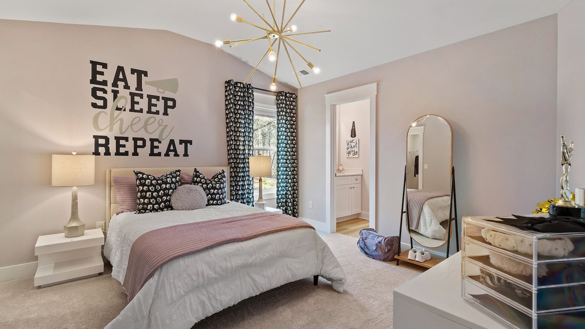 Secondary bedroom with spacious layout, natural light, and neutral finishes at Saddleridge in Senoia, GA.
