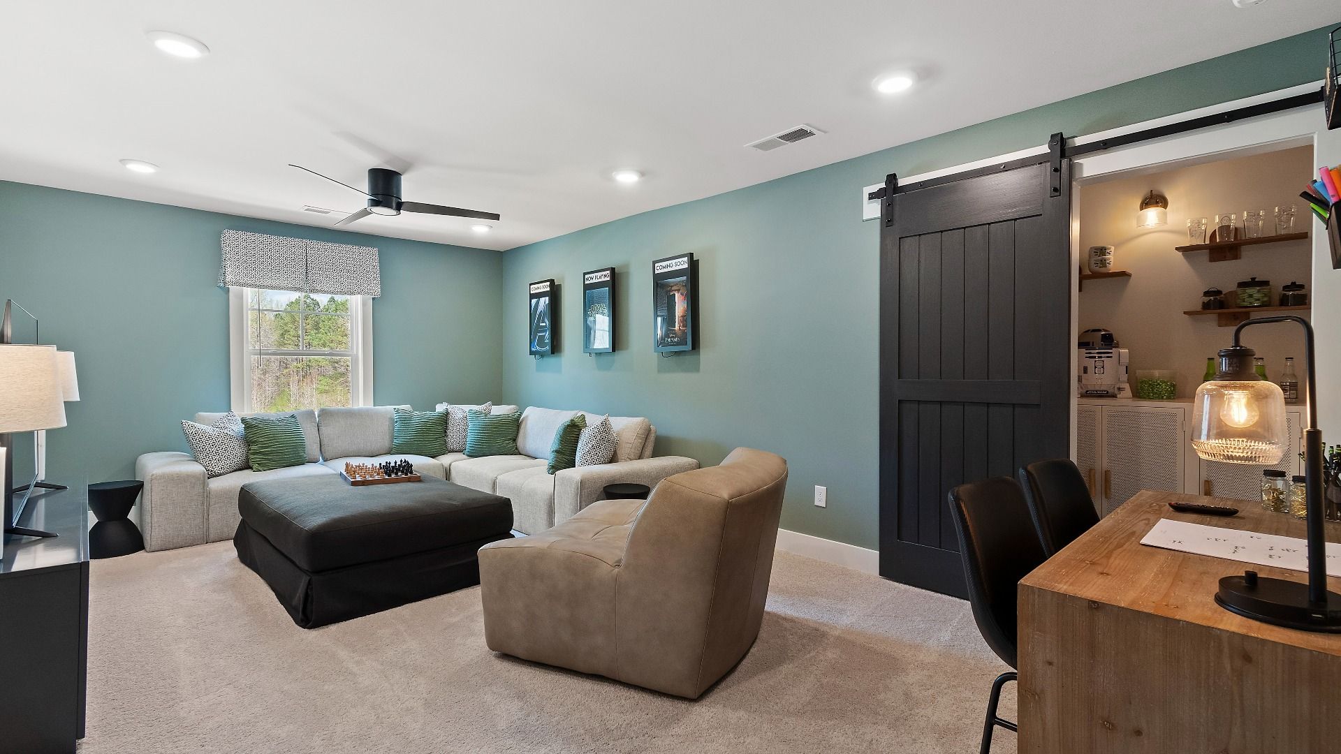 Upper level bonus room designed for flexible everyday living at Saddleridge in Senoia, GA.