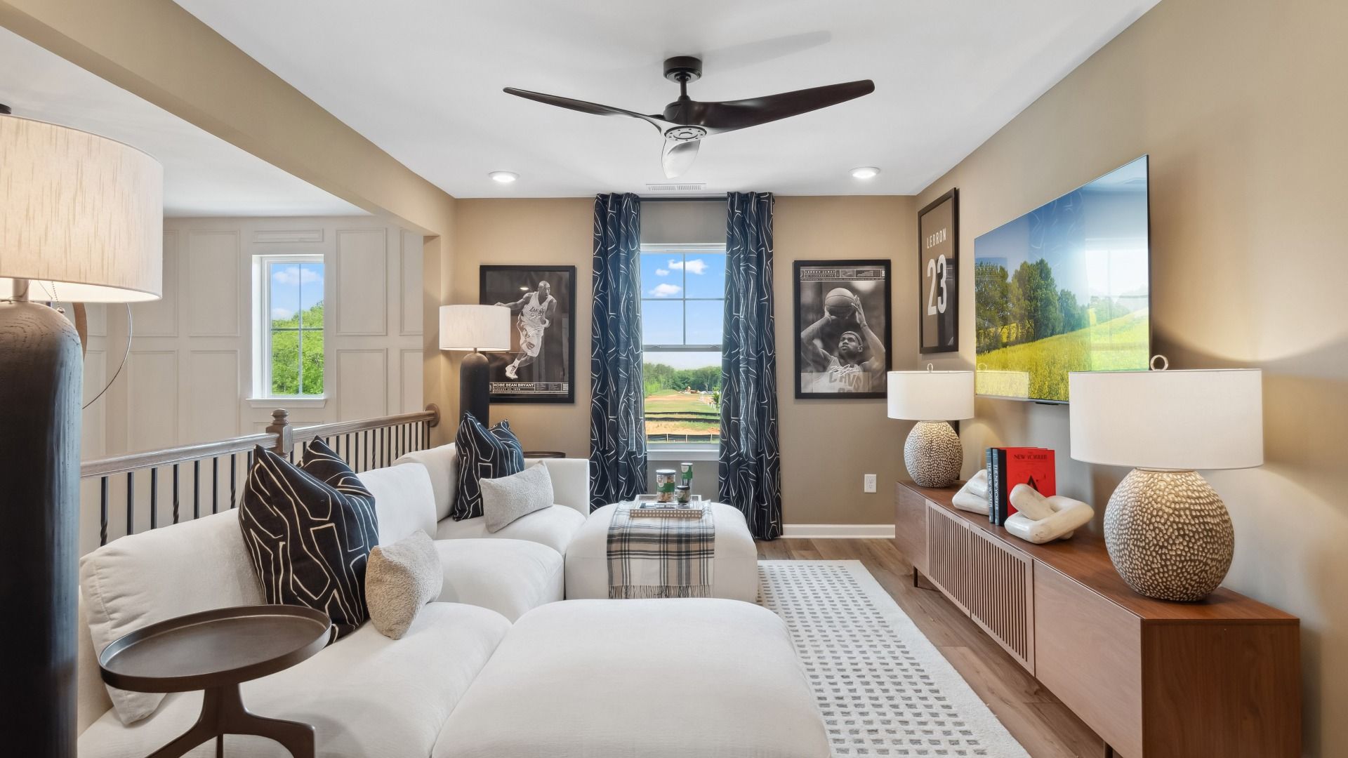 Open loft space with natural light for comfortable living and versatile use at Westwind Estates in Hampton, GA.
