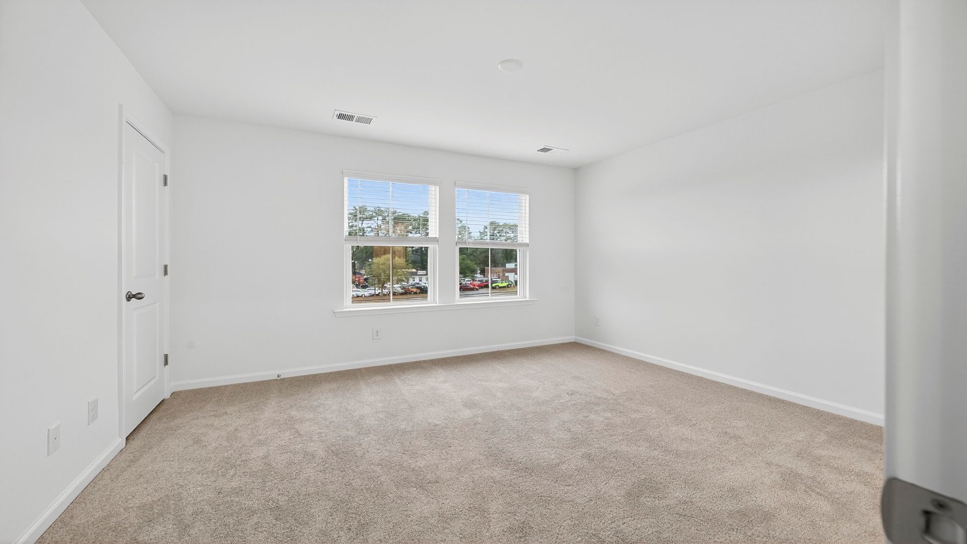 Bedroom with lots of natural light Hayden Floorplan at Clear Springs Townhomes