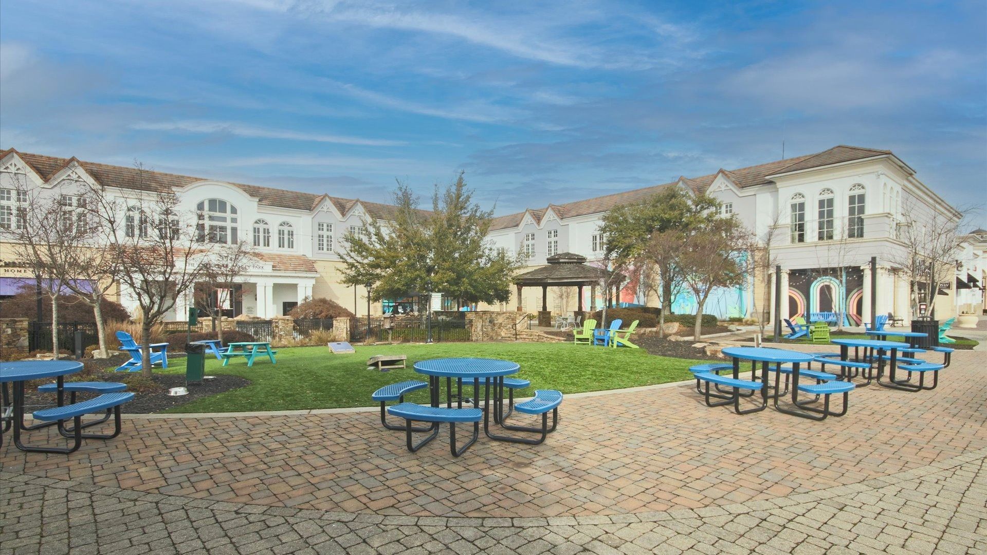 Ashley Park welcoming outdoor greenspace with pavilion, picnic tables, and cornhole in Newnan, GA near Daybreak.