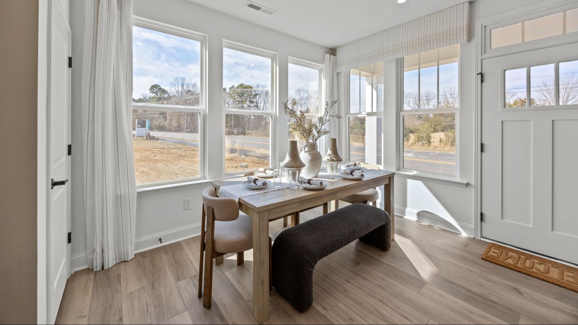 The Rochester Plan by DRB homes cozy dining area with multiple points of natural light in Charlotte, NC.