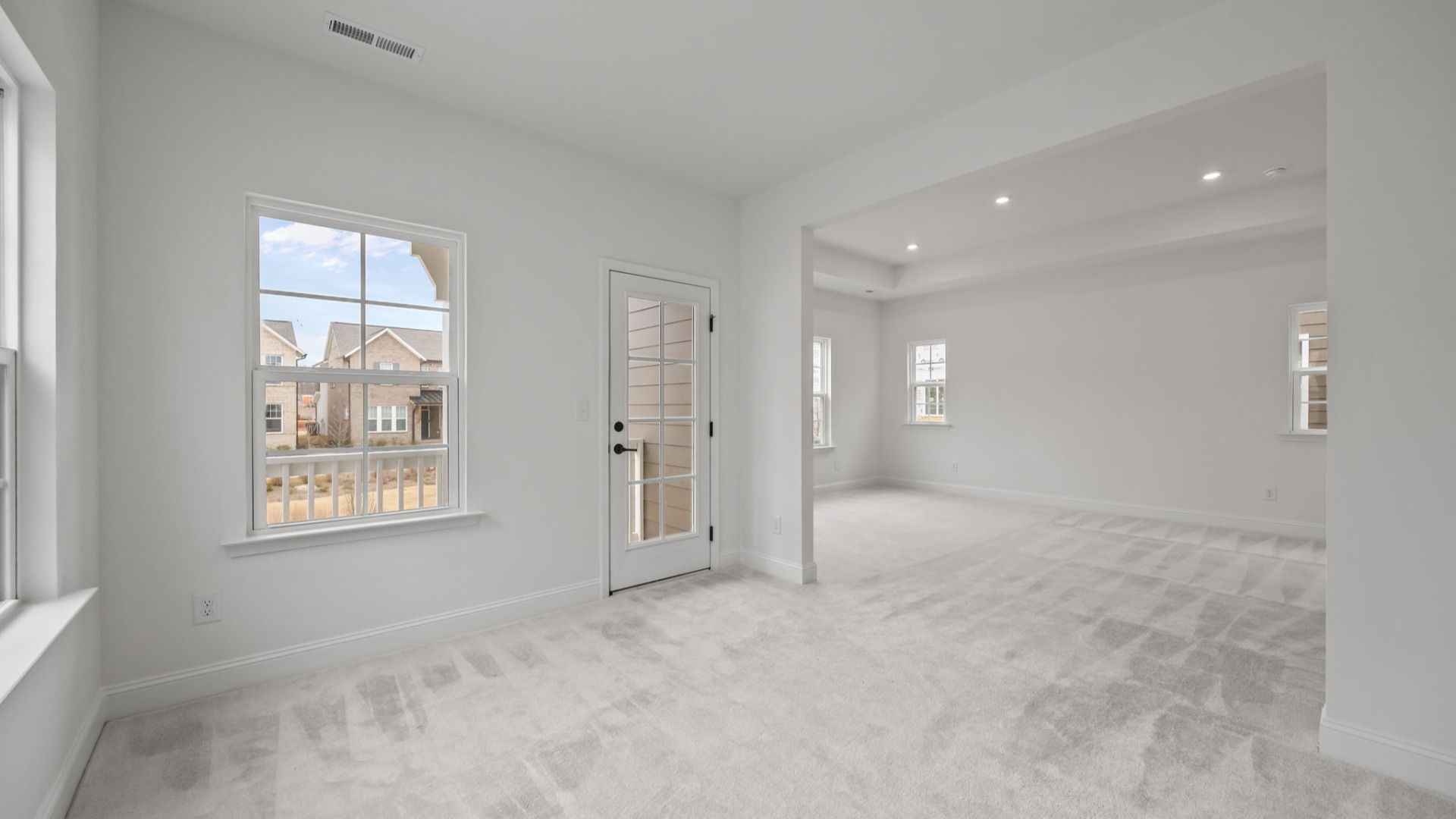 The Brentwood Plan by DRB Homes in River District, Charlotte NC.- Primary Bedroom with Sitting Area