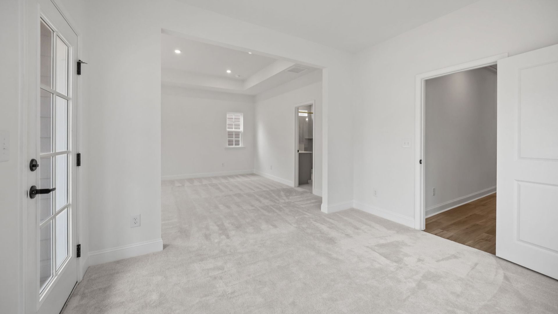 The Brentwood Plan by DRB Homes in River District, Charlotte NC.- Primary Bedroom with Sitting Area