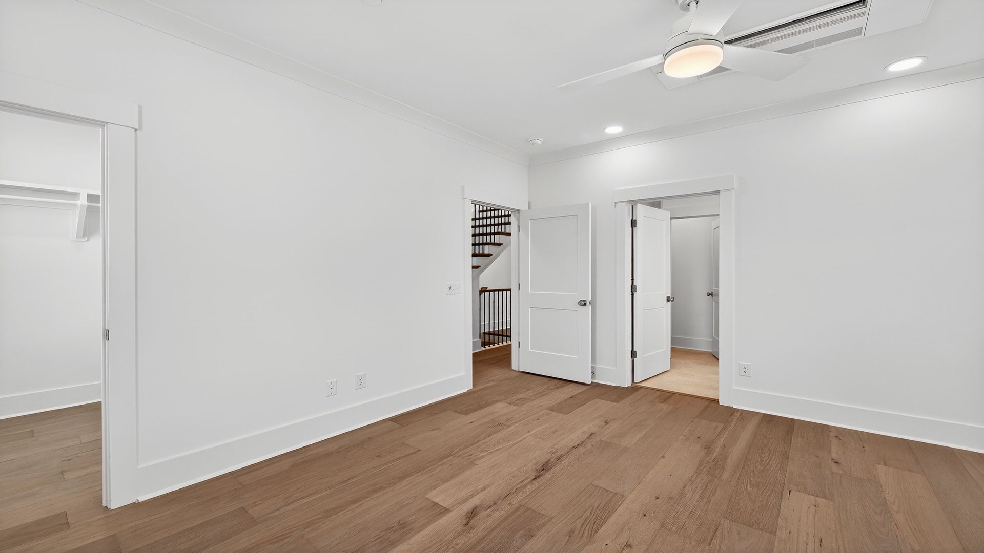 Large primary bedroom in the Seabrook floor plan designed for comfort and privacy.