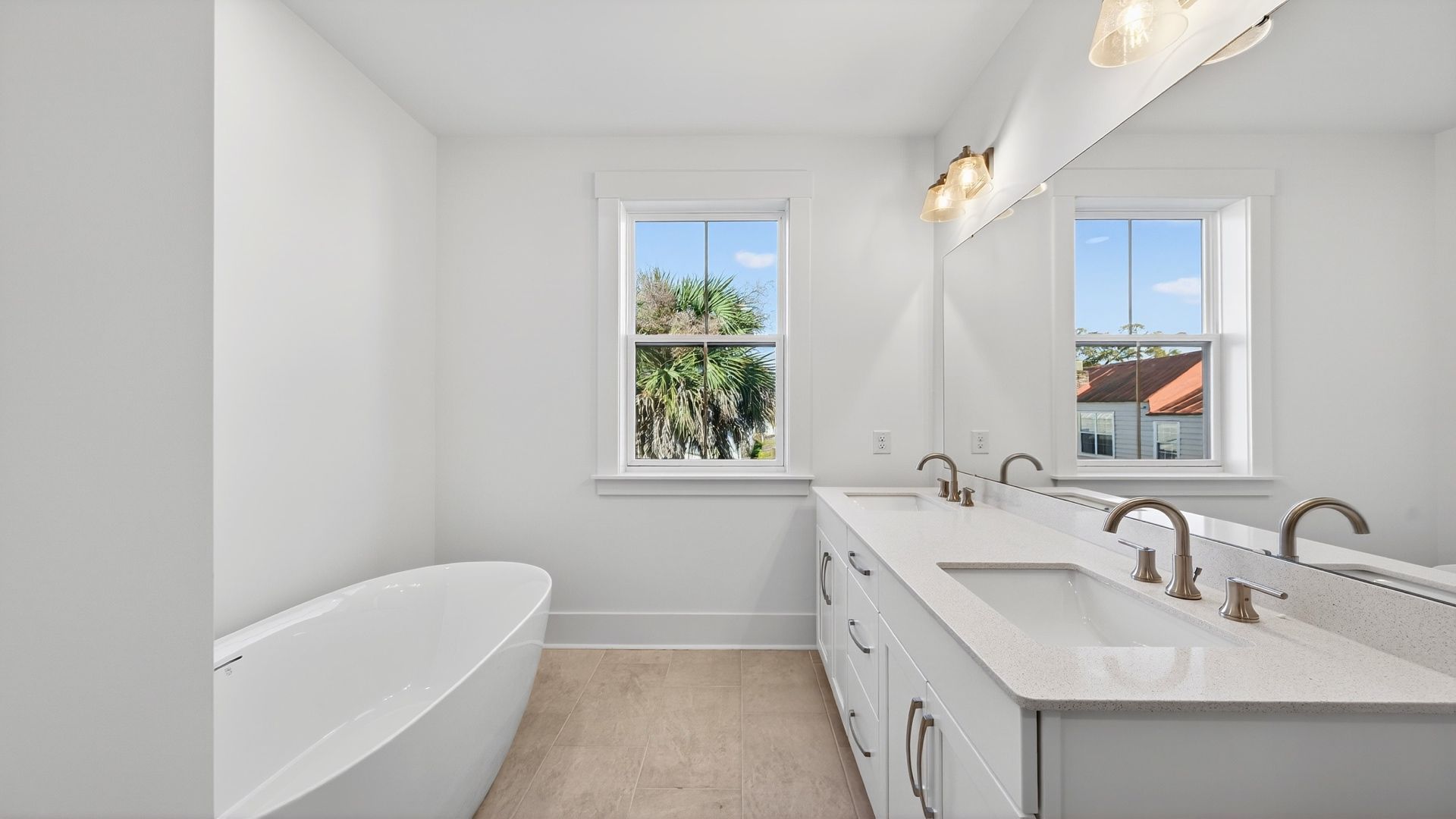 The Seabrook primary bathroom features a bright layout with modern finishes and a relaxing design.