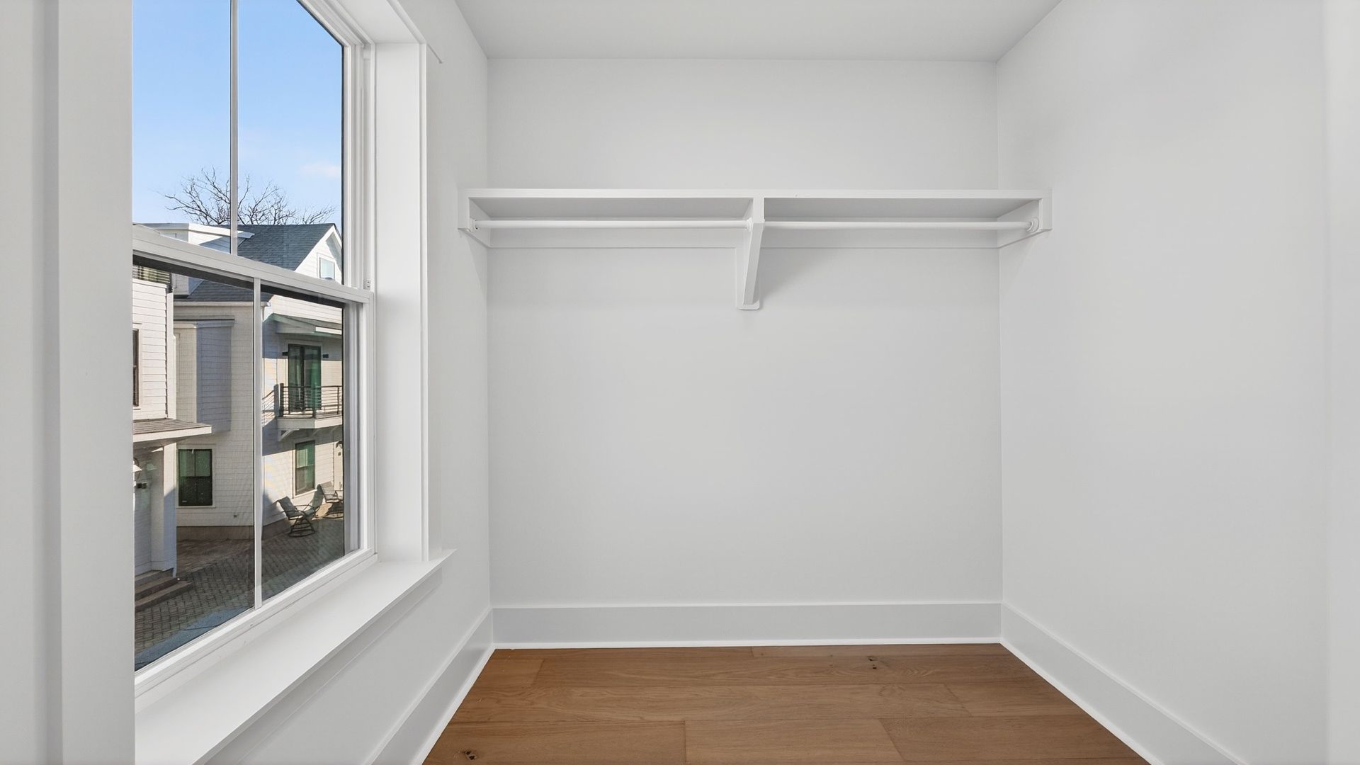 The Seabrook primary suite includes a spacious walk-in closet with ample storage space.