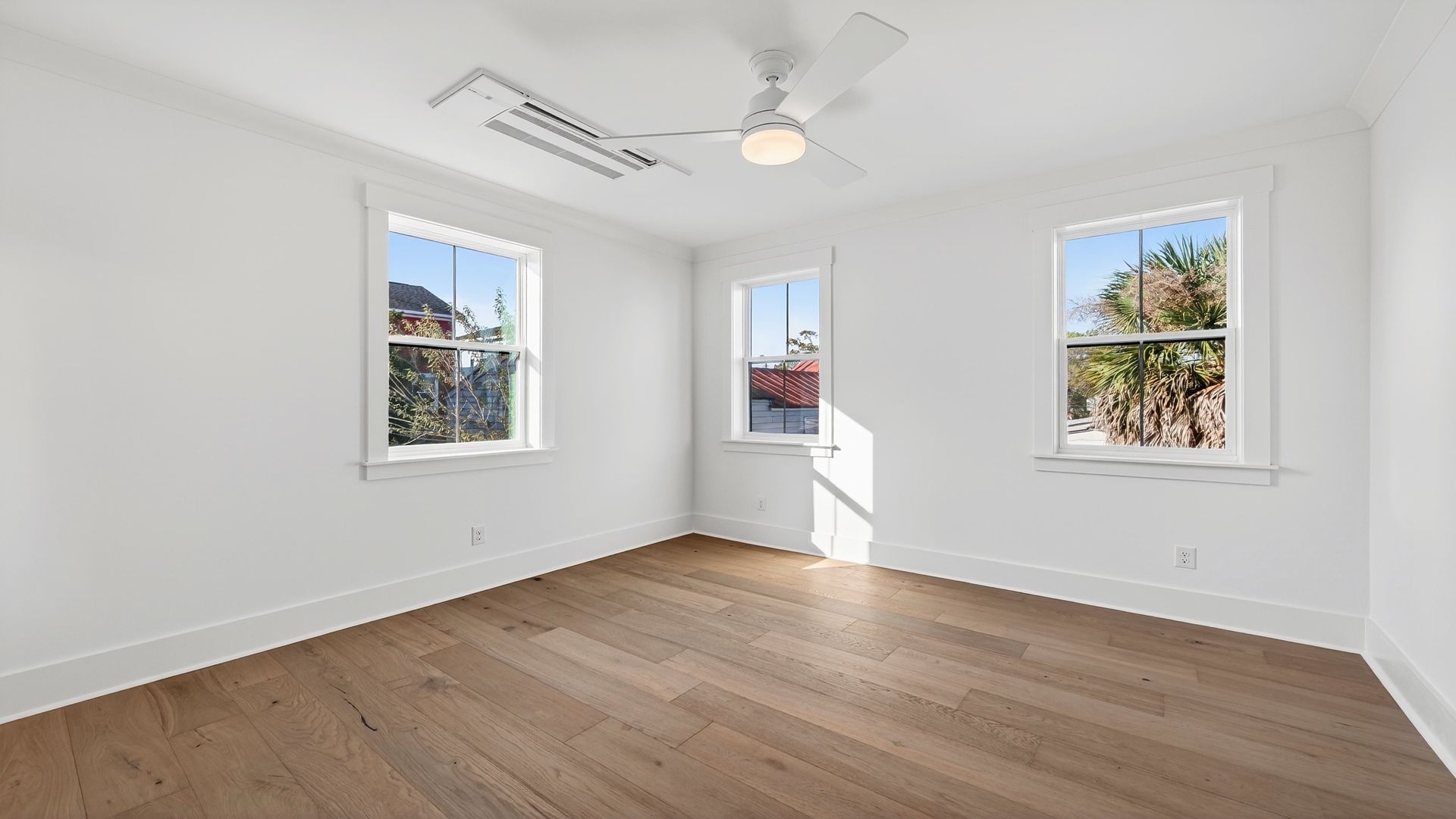 Bright secondary bedroom in the Seabrook home with natural light and versatile living space.