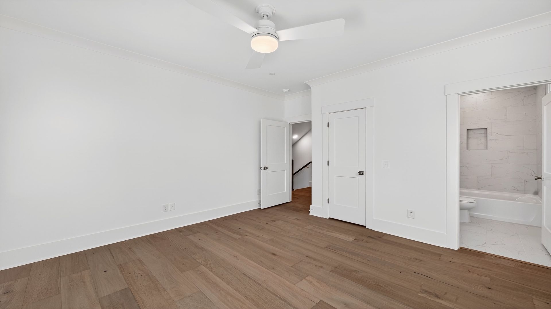 The Seabrook secondary bedroom offers comfortable living space with convenient closet storage.