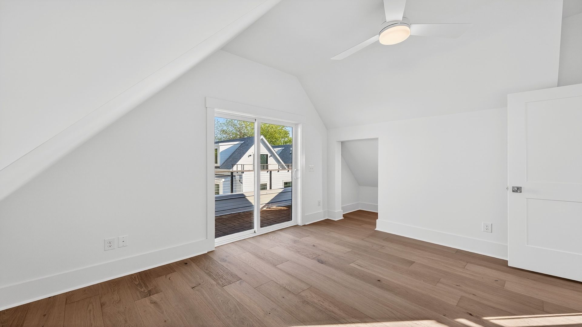 Secondary bedroom in the Seabrook home featuring natural light and flexible living space.