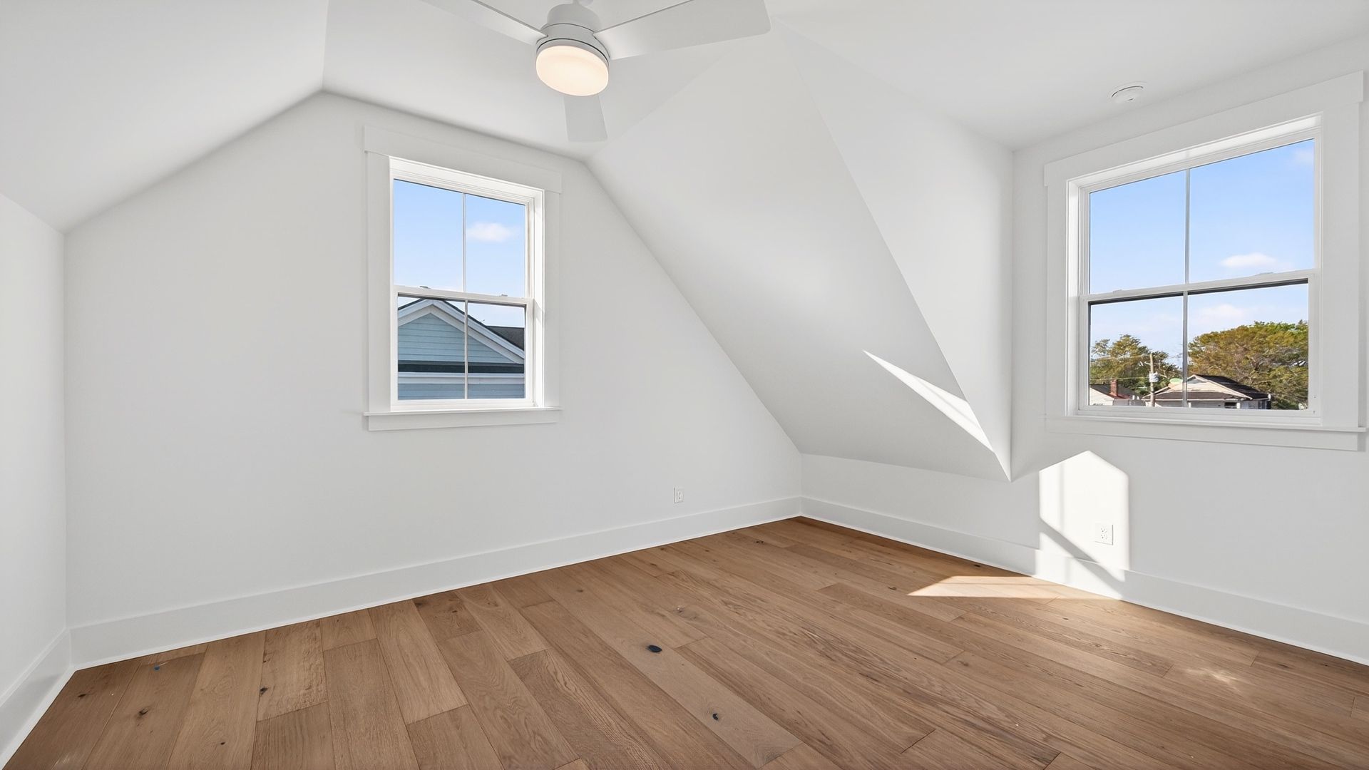 Bright secondary bedroom in the Seabrook floor plan with natural light and versatile design.