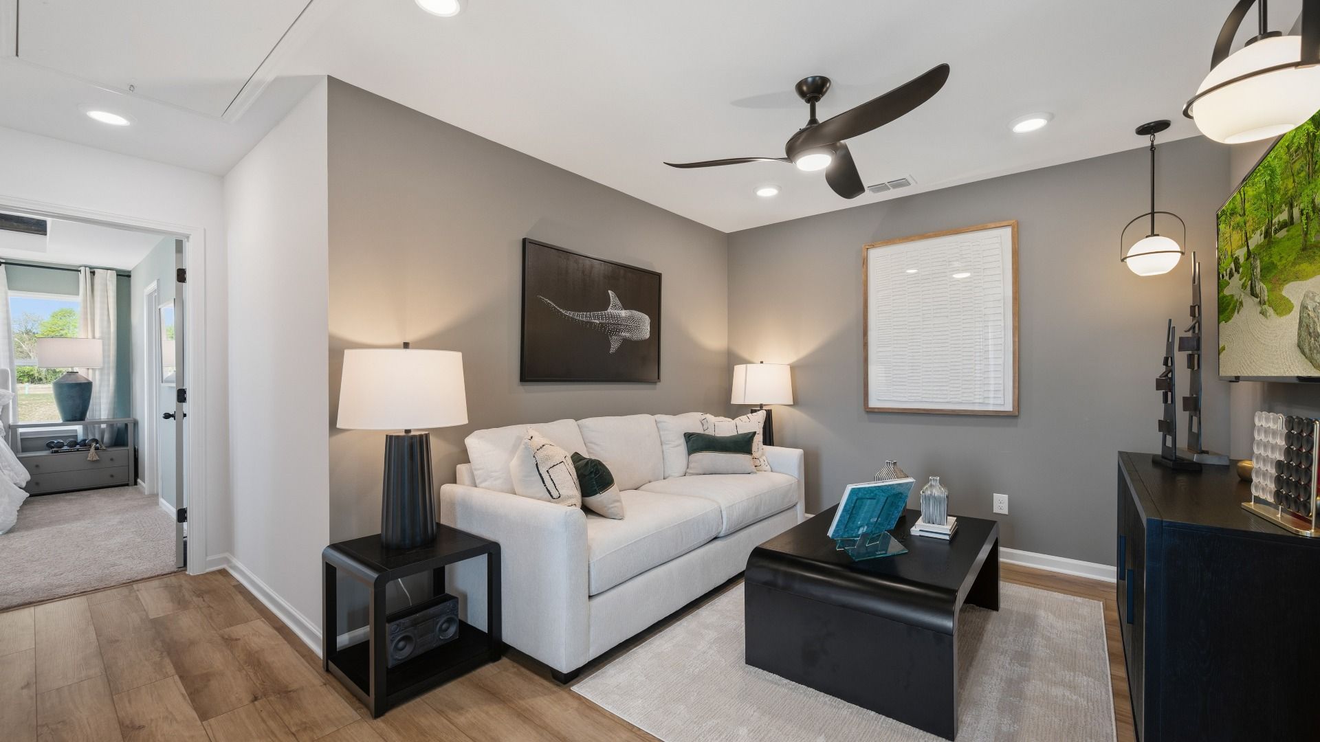 Open loft space with modern design and flexible use in Langley Overlook townhome in Loganville, Georgia.