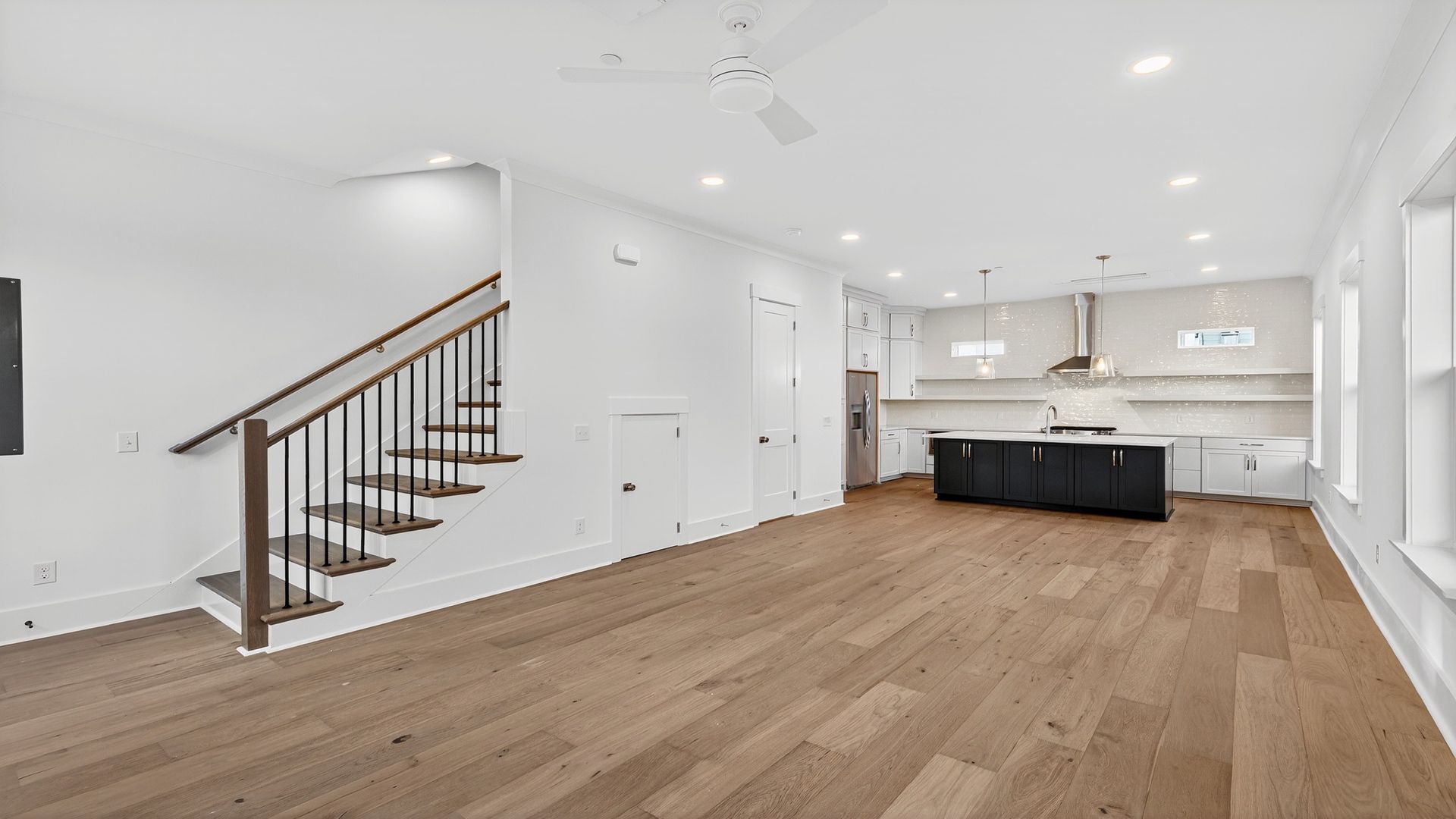Spacious living room in the Seabrook home plan with open-concept design and natural light.