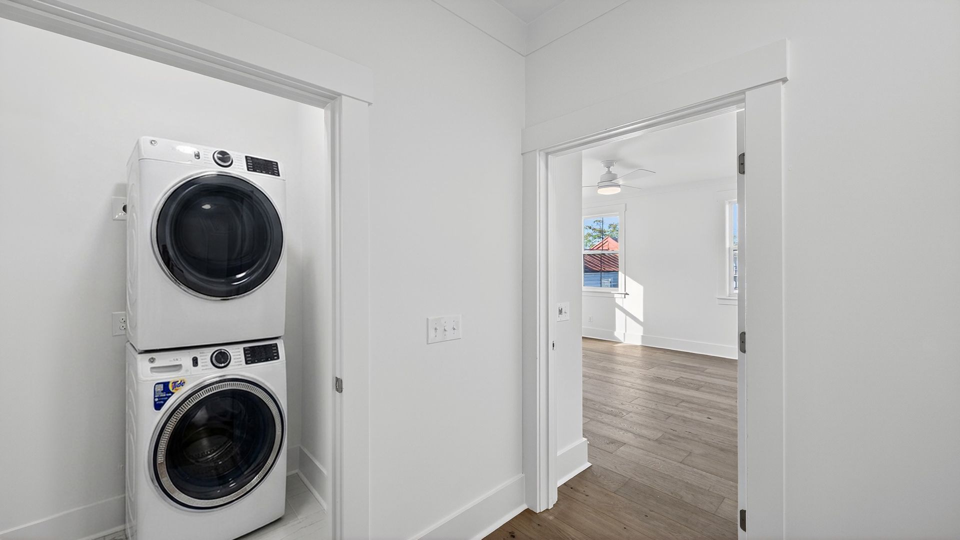 Convenient laundry room in the Seabrook floor plan with stacked washer and dryer connections and functional design.