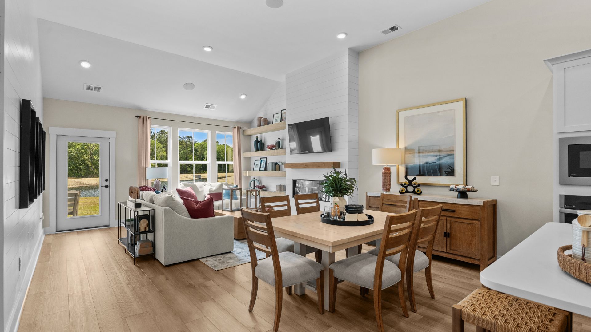 The Summit living room offers open-concept comfort and natural light throughout.