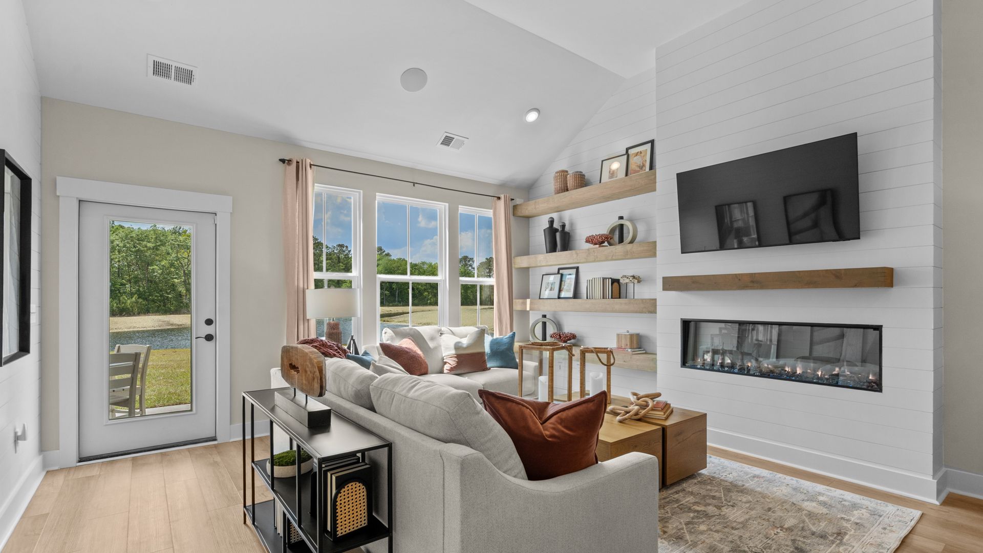 Spacious living room in the Summit home plan designed for gathering and relaxation.