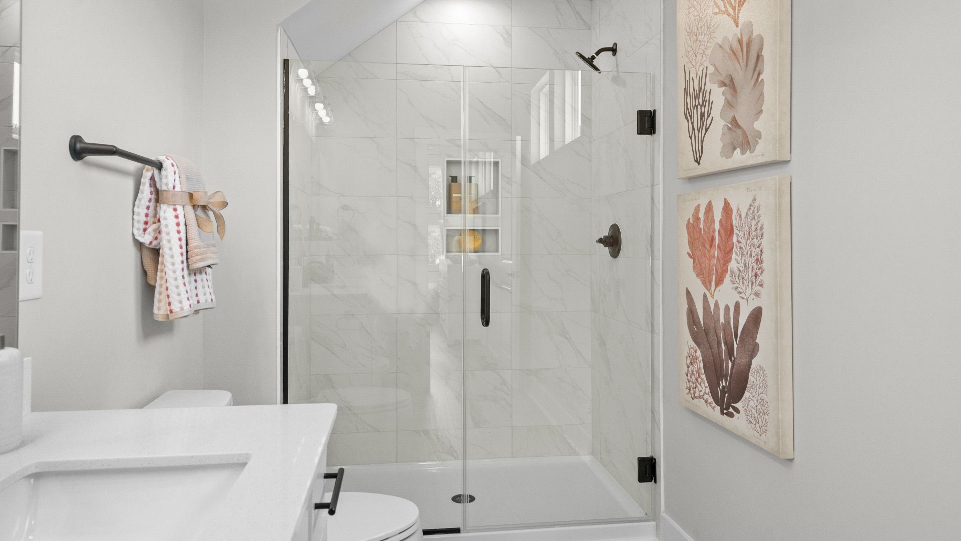 Spacious primary shower in the Summit home plan with stylish tile and elegant finishes.