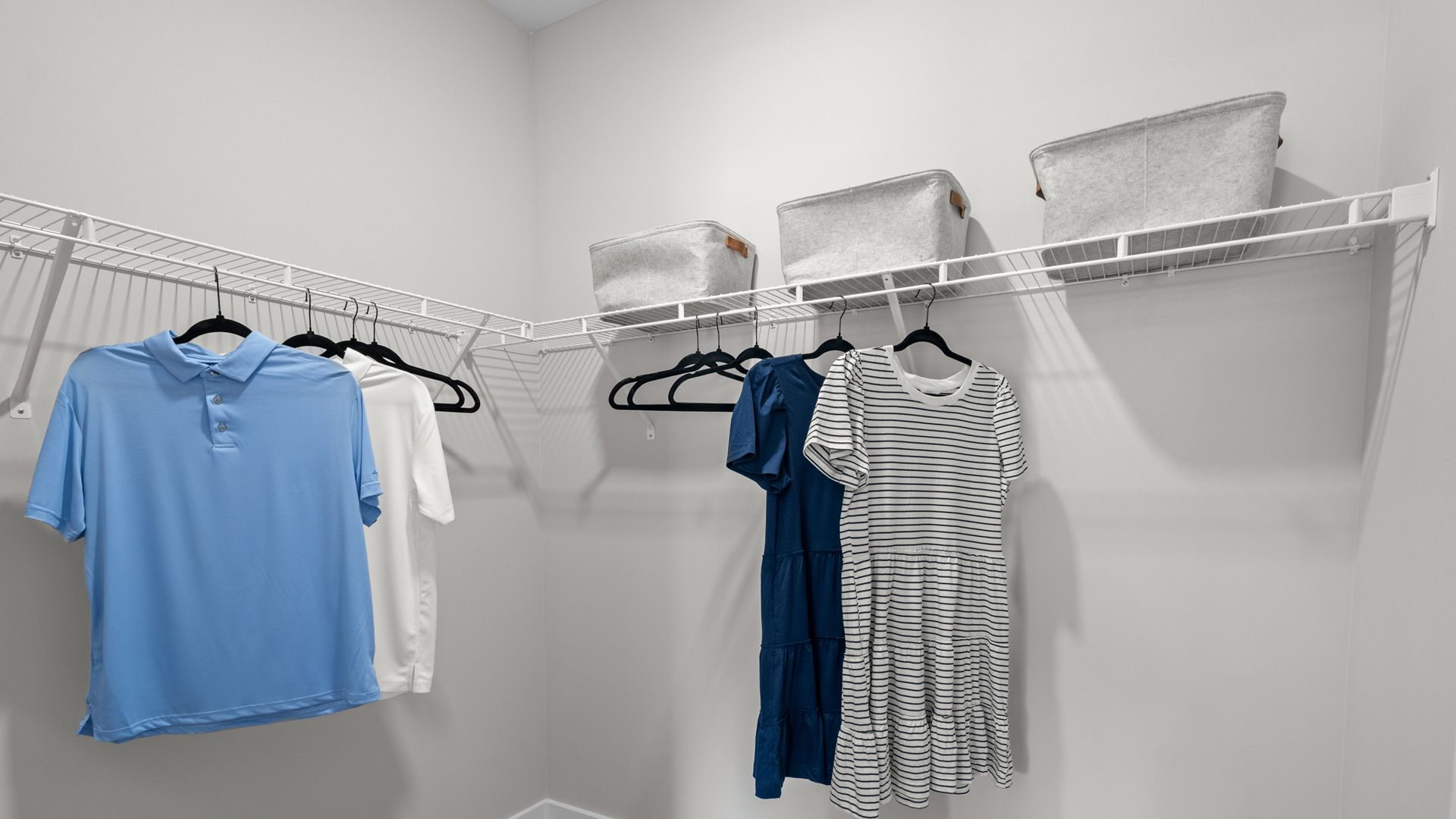 Spacious primary closet in the Summit home plan with generous storage options.