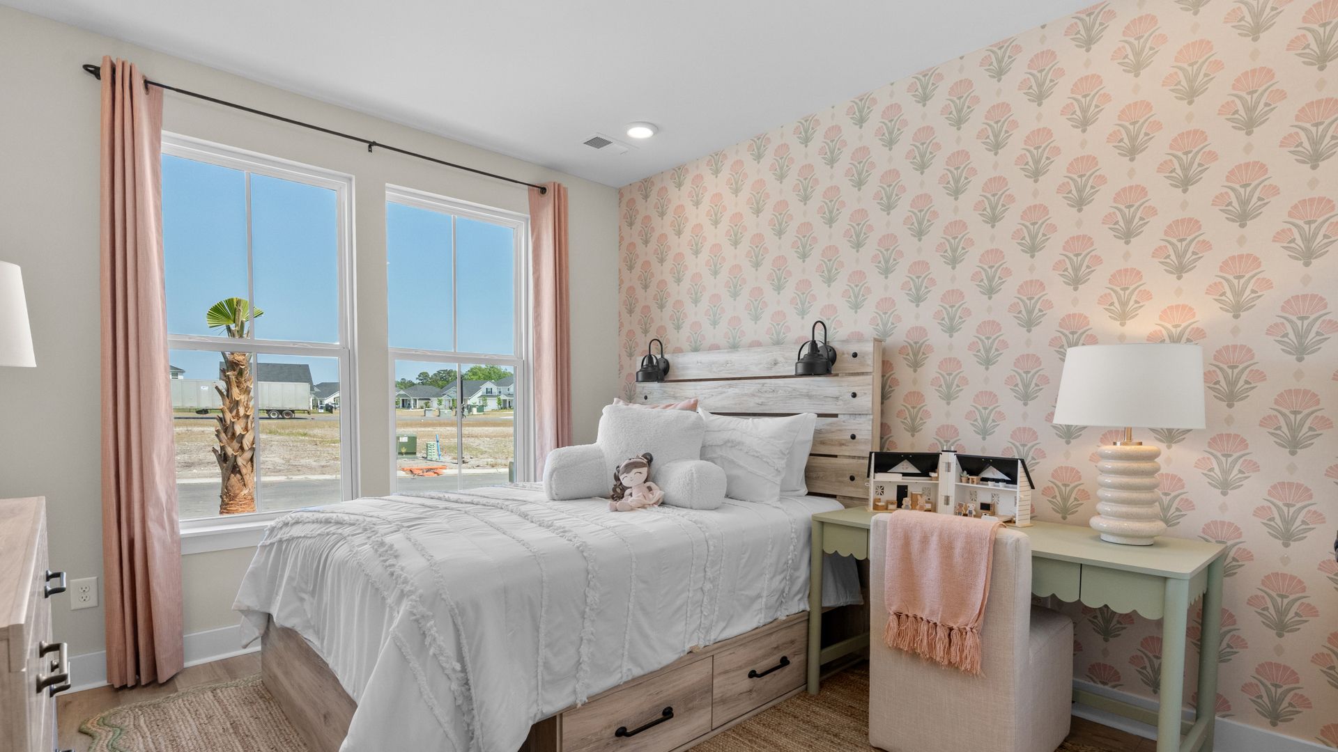 First-floor secondary bedroom in the Summit home plan with comfort and natural light.