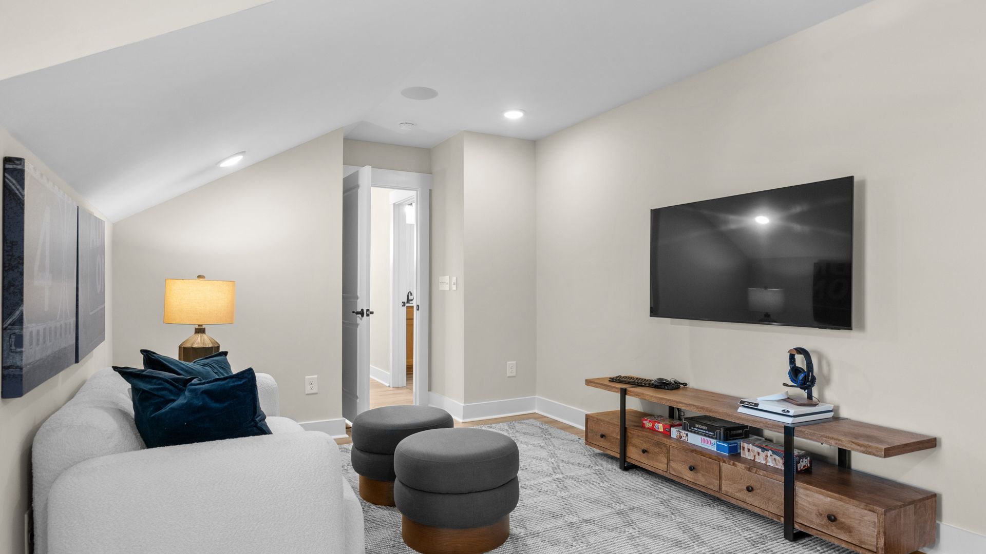 Second-floor bonus room in the Summit home plan with versatile space for entertaining or relaxing.