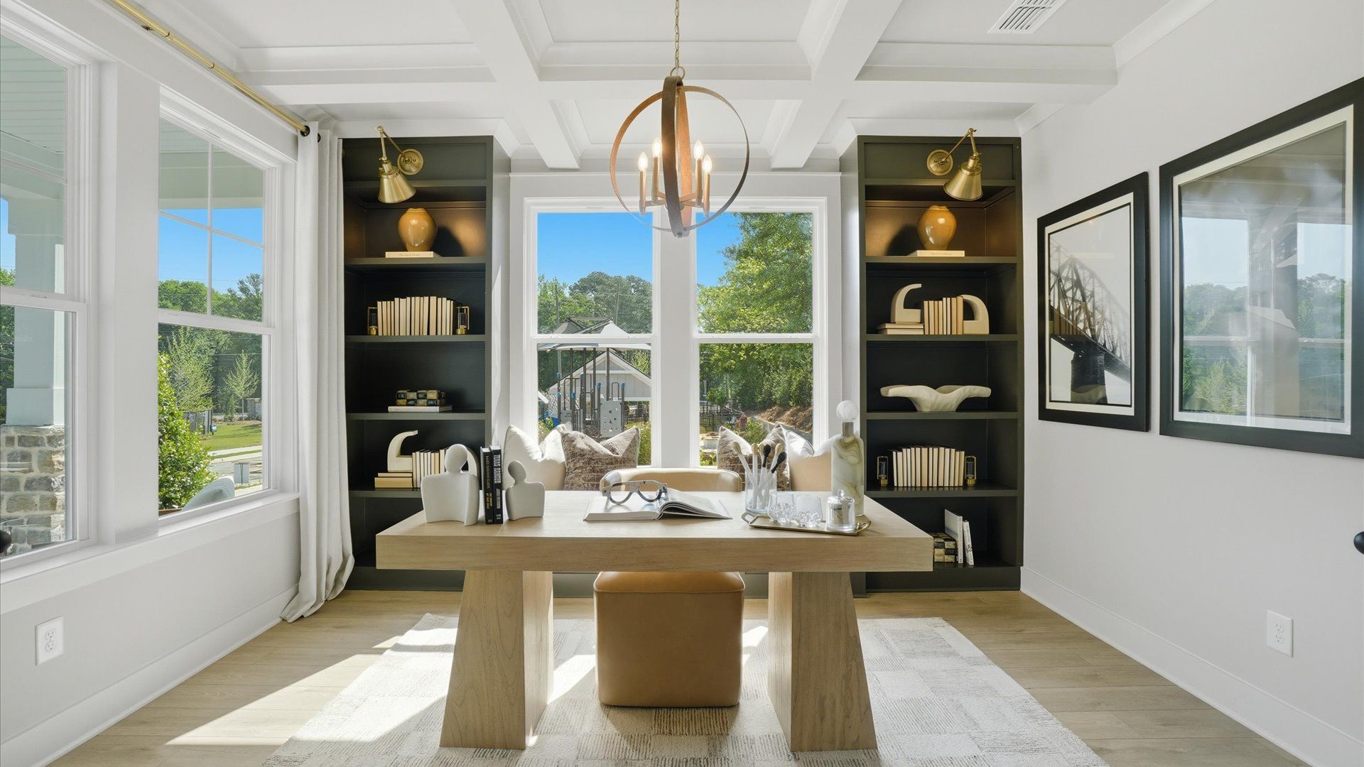 Flexible study with coffered ceiling and oversized windows for natural light at Northcroft in Loganville, GA.