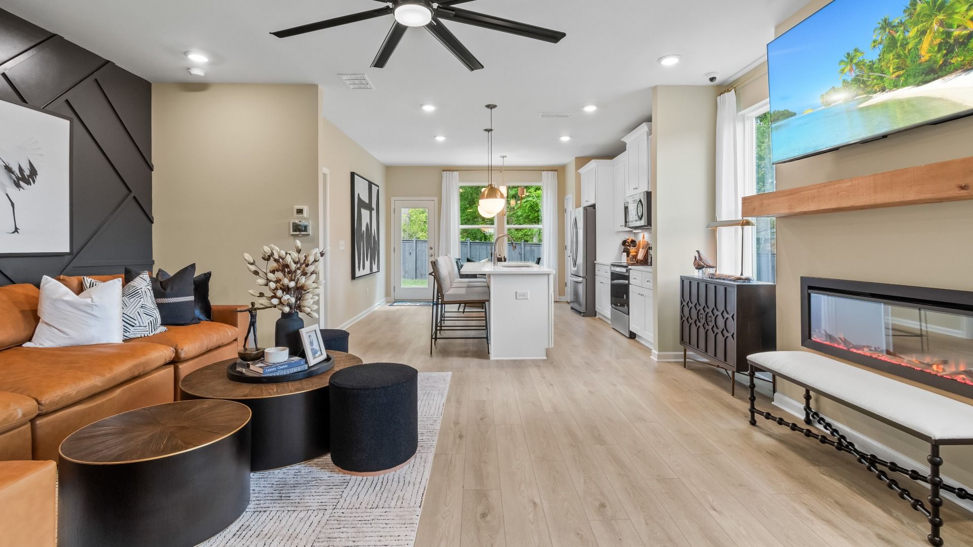 Spacious open-concept family room at Enclave at Evergreen in Fairburn, GA with natural light and modern finishes.
