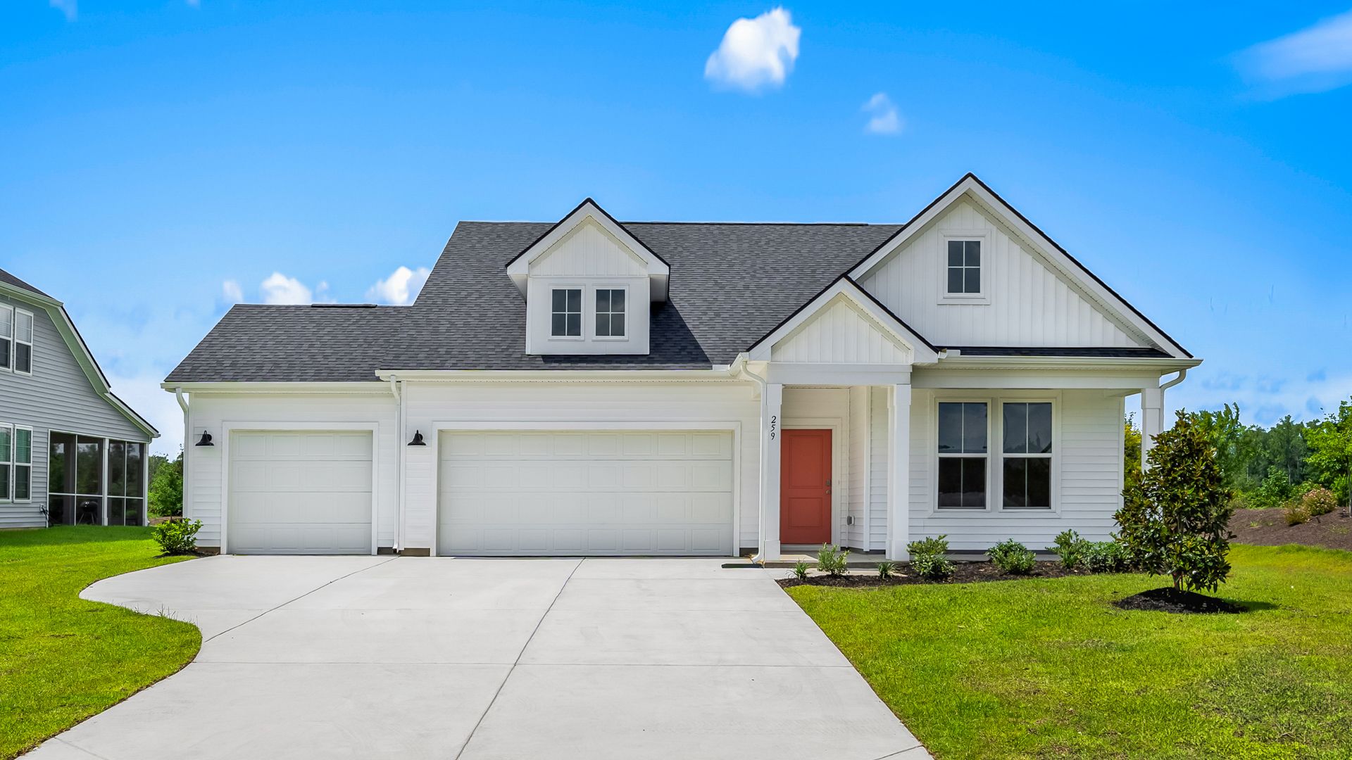 Easton Elevation 5 in Chestnut Farms, featuring a classic exterior with dormer windows and a welcoming covered entry