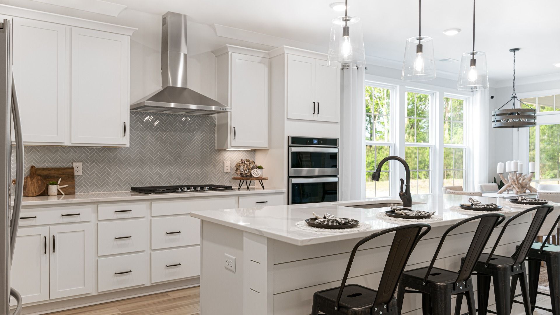 gourmet kitchen in lighthouse floor plan with giant island for hosting