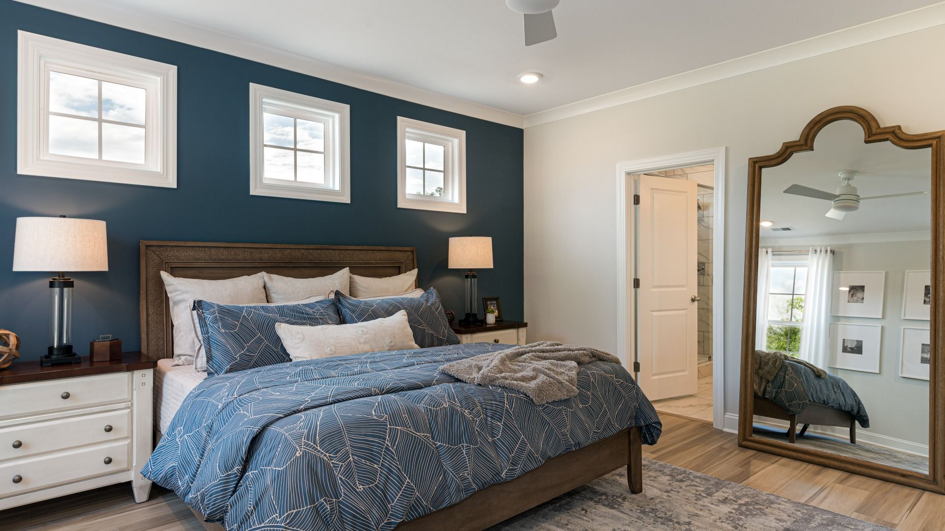 owner's suite on first level with king bed and tons of natural light
