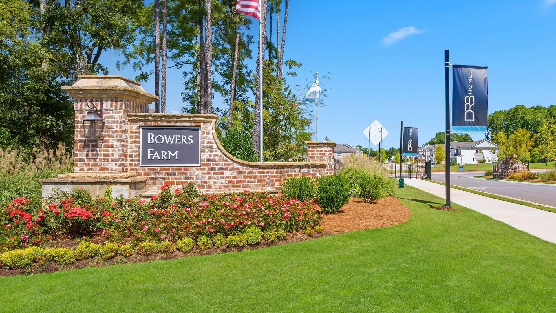 Welcoming monument of Bowers Farm in McDonough, GA marking the community entrance with manicured landscaping.