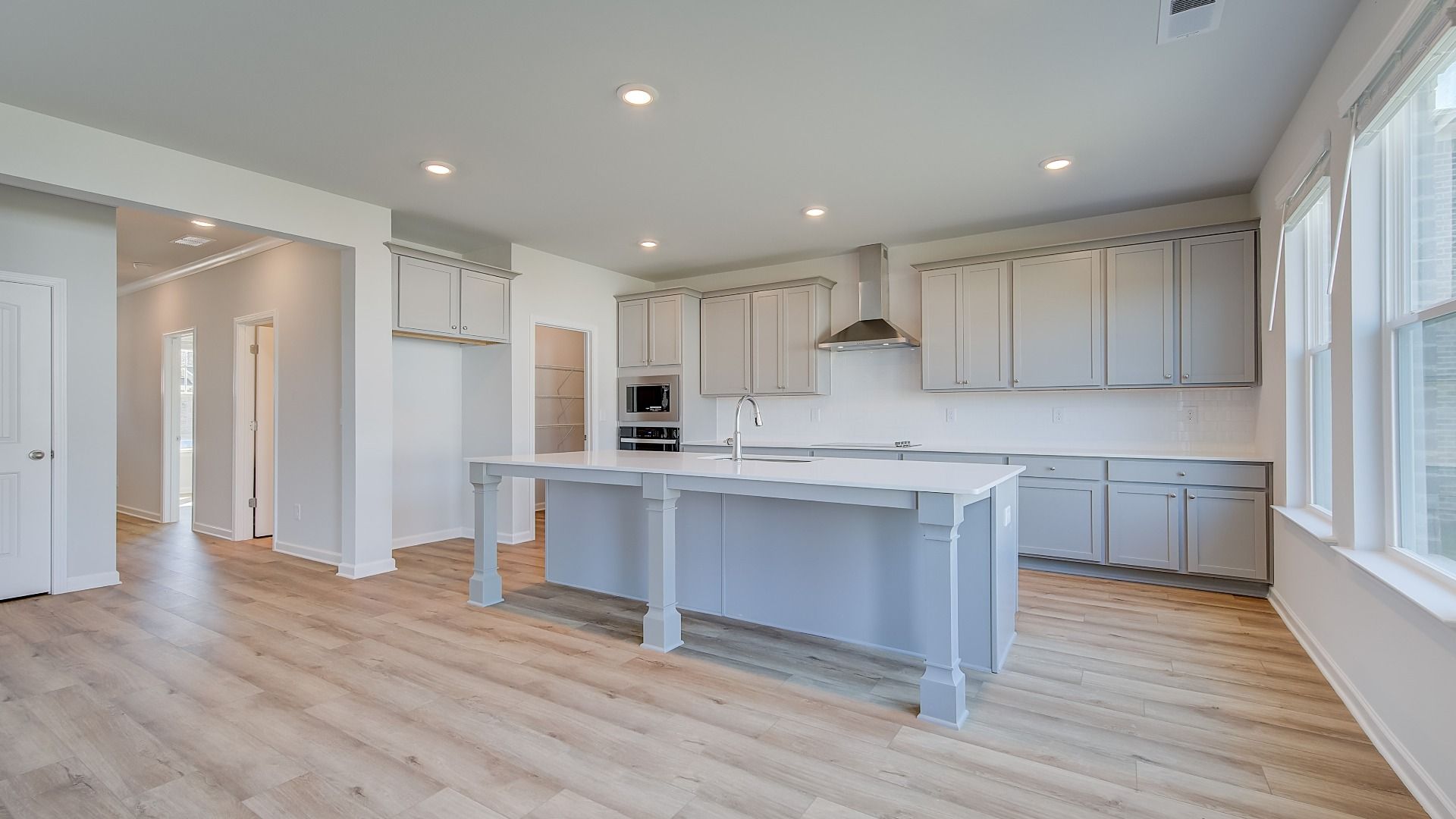 Spacious open breakfast area connecting to kitchen in the Ridgewood at Bowers Farm in McDonough, GA.