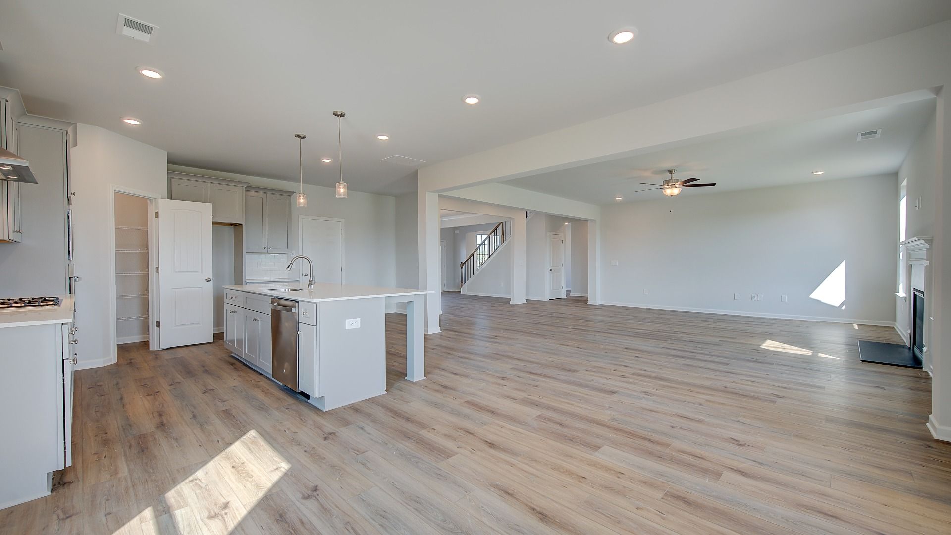 McKinley II breakfast area connected to kitchen with natural light and open layout at Brighton in Locust Grove, GA.