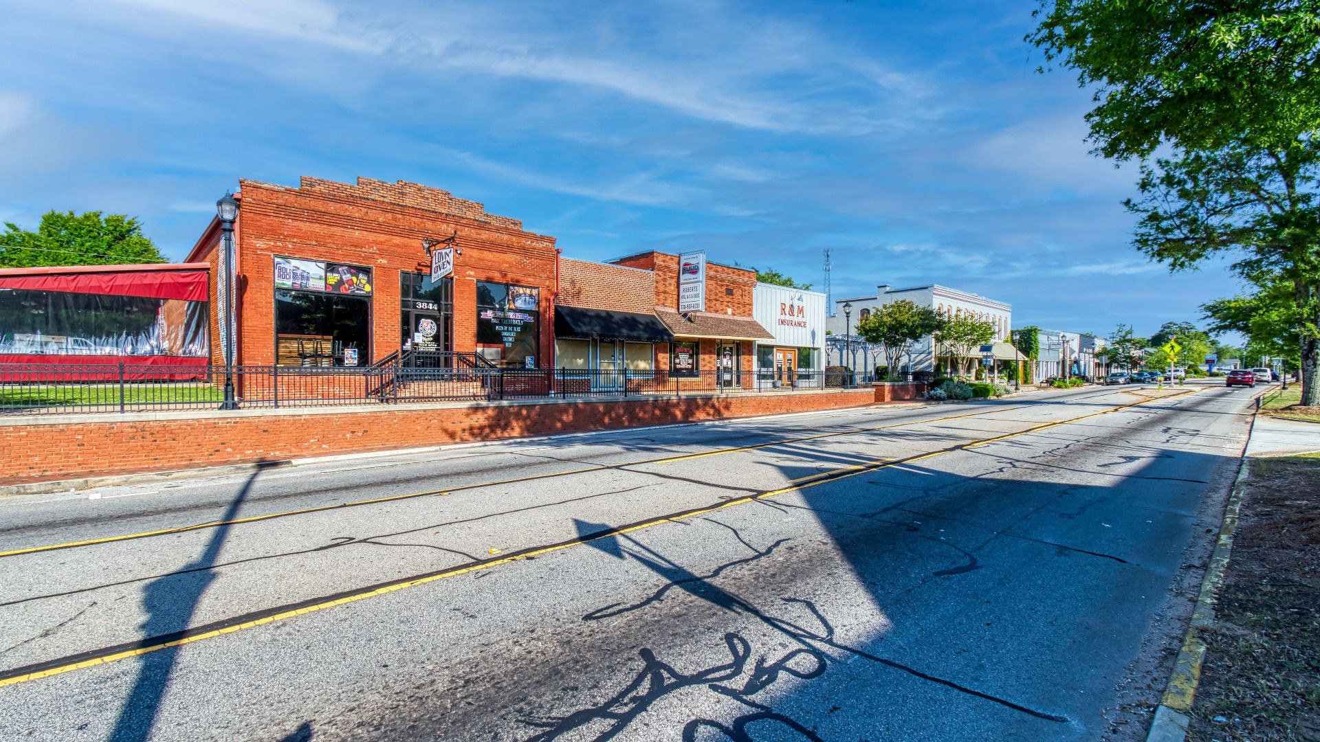 Walkable downtown strip in Locust Grove, Georgia with variety of entertainment options.