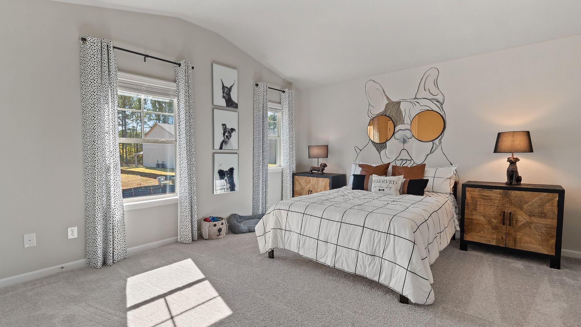 McKinley II spacious secondary bedroom with carpet flooring and natural light at Brighton in Locust Grove, GA.