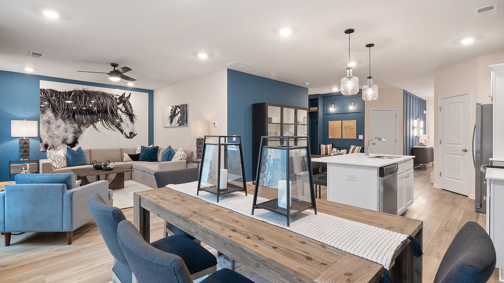 Zoey II breakfast area with view to kitchen and family room, featuring large window at Abbotts Crossing in Conyers, GA.