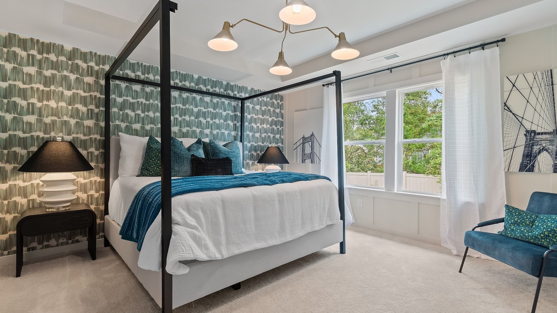 Primary suite with tray ceiling in new construction townhome at Avery Landing in McDonough, GA