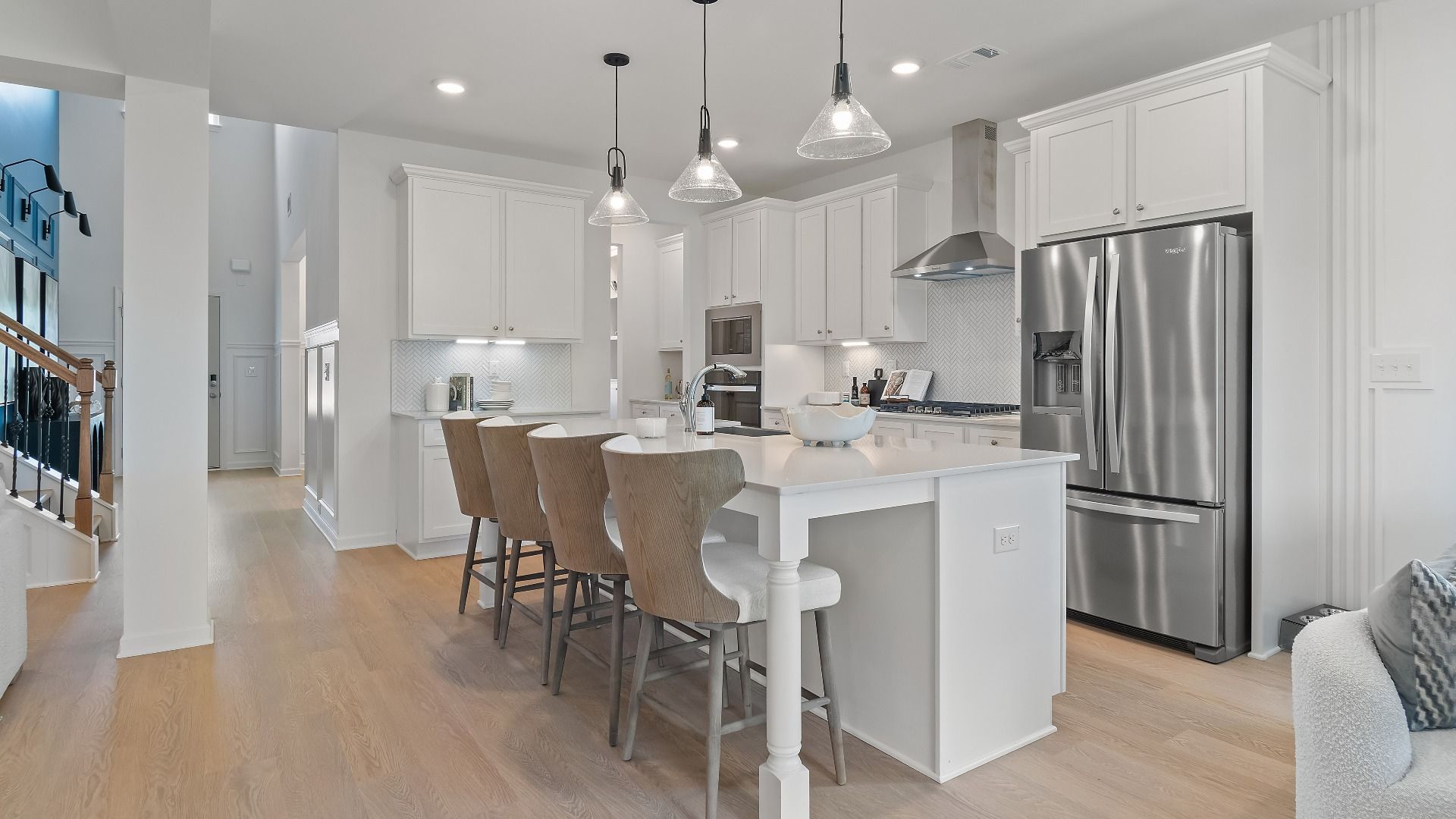 Modern kitchen featuring a butler’s pantry and large island at Grandview at Millers Mill in Stockbridge, GA.